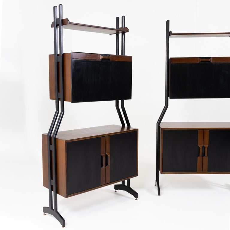 Two shelves with two-door lower part and hinged upper part with glass shelf. Attributed to Vittrio Dassi.