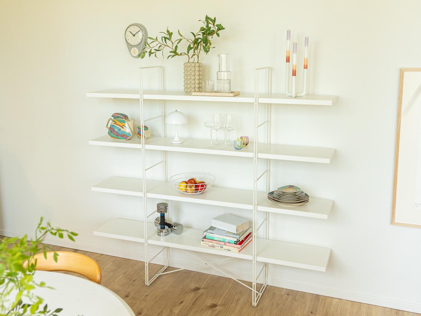 Shelving system ENETRI by Niels Gammelgaard for IKEA from the 2000s. New edition of the GUIDE system from 1985. Powder-coated metal frame in white with four chipboard shelves in white.
Quality Features:

    good workmanship
    high quality