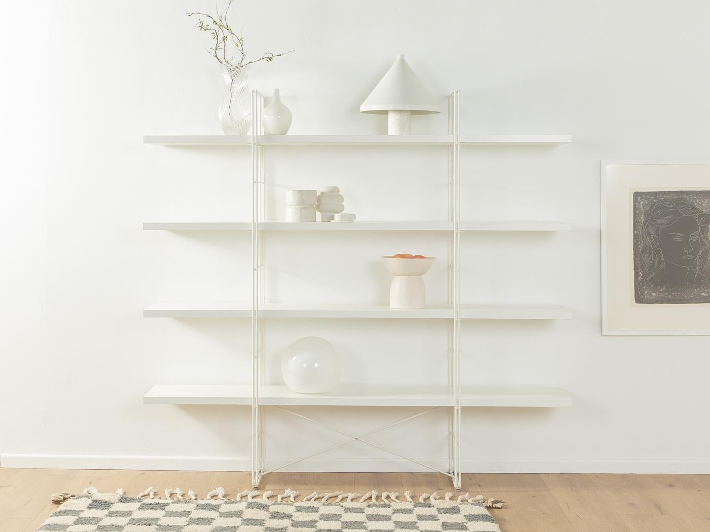 helving system ENETRI by Niels Gammelgaard for IKEA from the 2000s. New edition of the GUIDE system from 1985. Powder-coated metal frame in white with four chipboard shelves in white.
Quality Features:

    good workmanship
    high quality