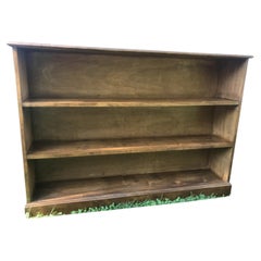 Shelving unit in walnut veneer