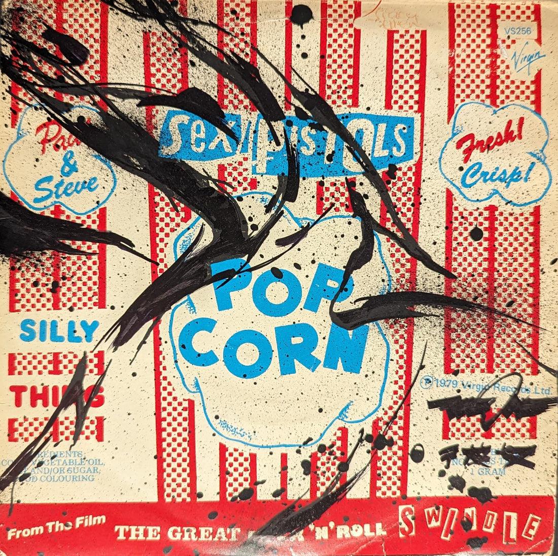 SheOne, [ POPCORN ] III, 2023

Original mixed media work on Vintage Sex Pistols 7" Vinyl

17.78 x 17.78 cm  7 x 7 in



James Choules aka SheOne is a British street artist famous for his abstract expressive pieces of art. Through his abstract