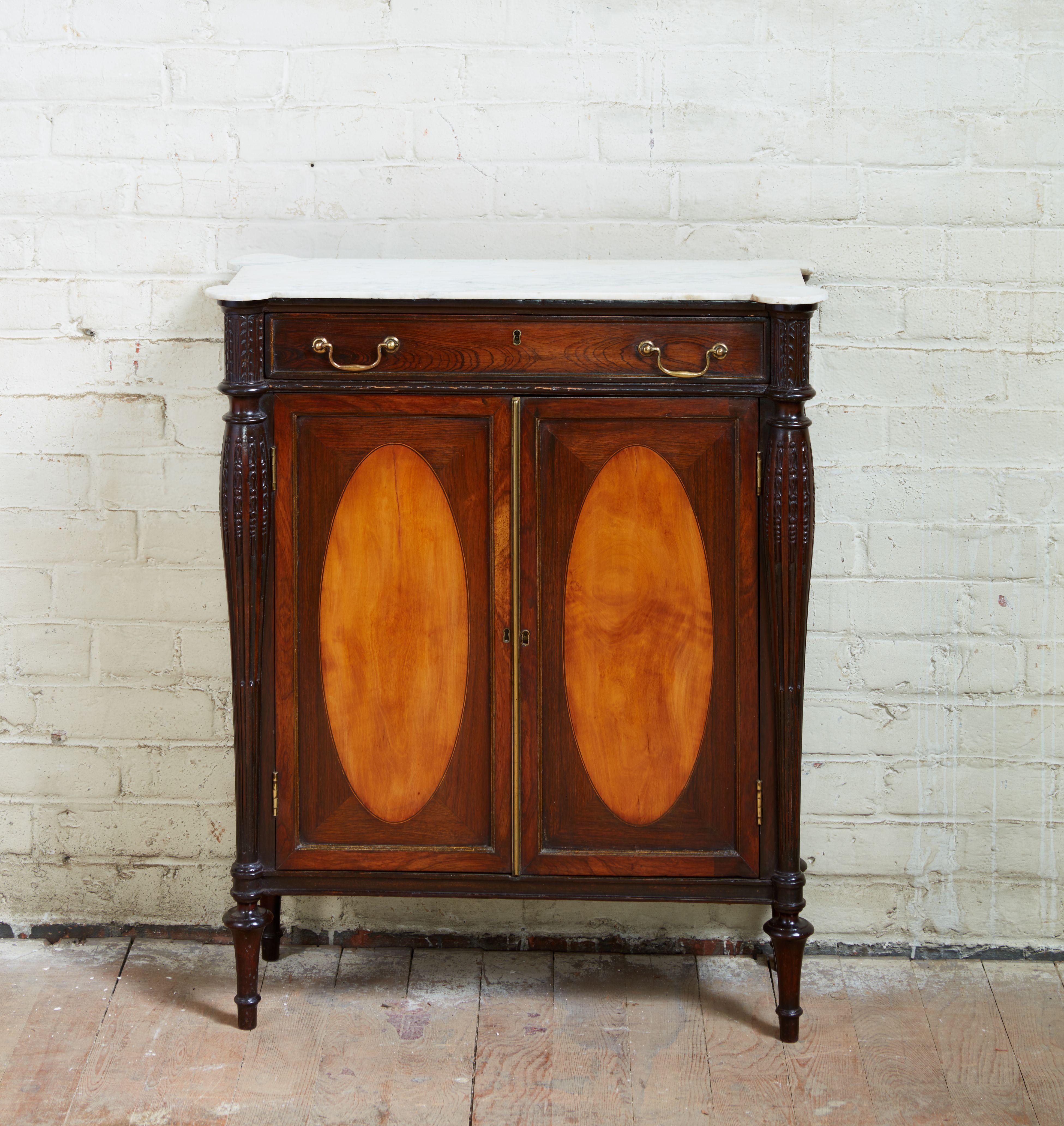 Rare George III period rosewood and satinwood cabinet of unusually shallow proportions, the white marble top with 