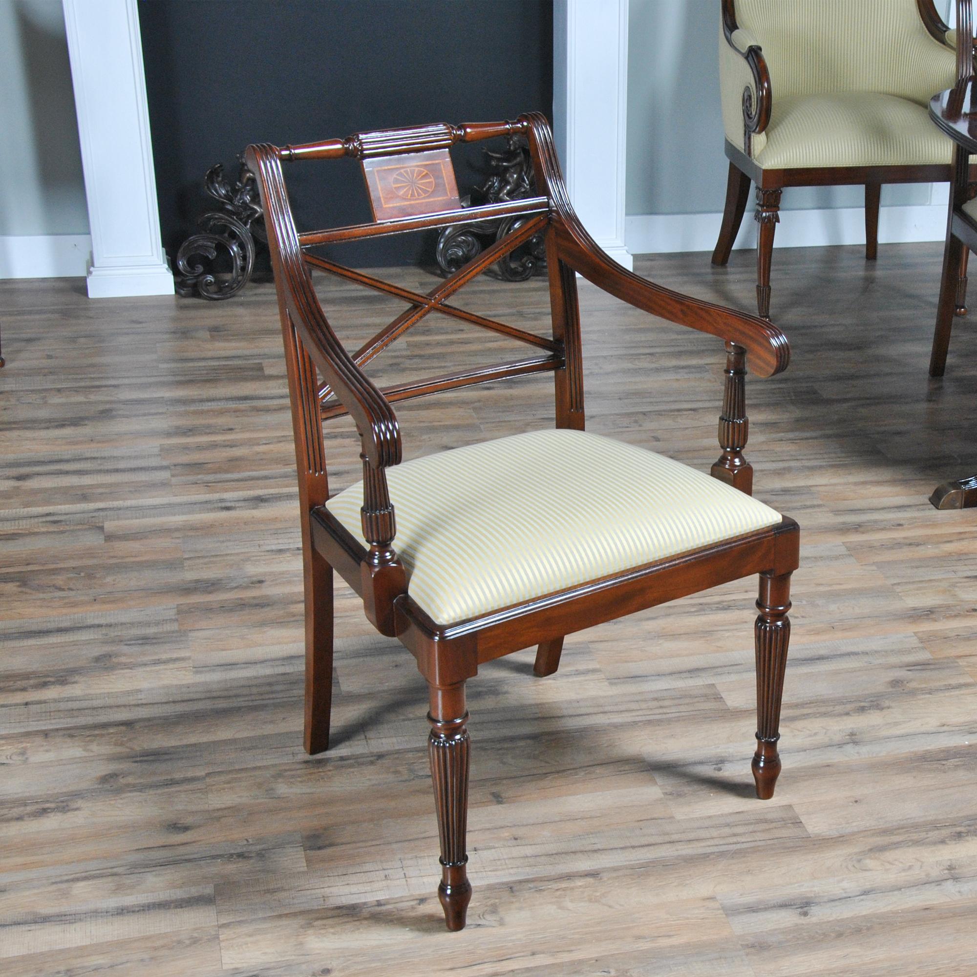 A set of ten Sheraton Mahogany Inlaid Chairs, these Sheraton inspired chairs have a lot of great features that set it apart from the competition. The chair is produced by skilled craftsmen using the finest quality, plantation grown solid mahogany.