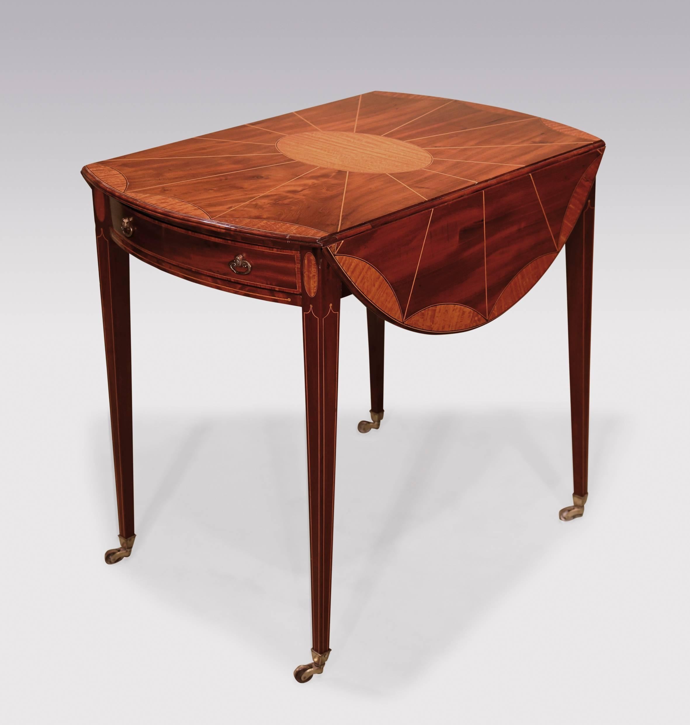 An attractive late 18th century Sheraton period well-figured mahogany Pembroke table, having boxwood line “segmented” oval top with satinwood central oval panel and satinwood scalloped edges, above tulipwood crossbanded frieze drawer, supported on