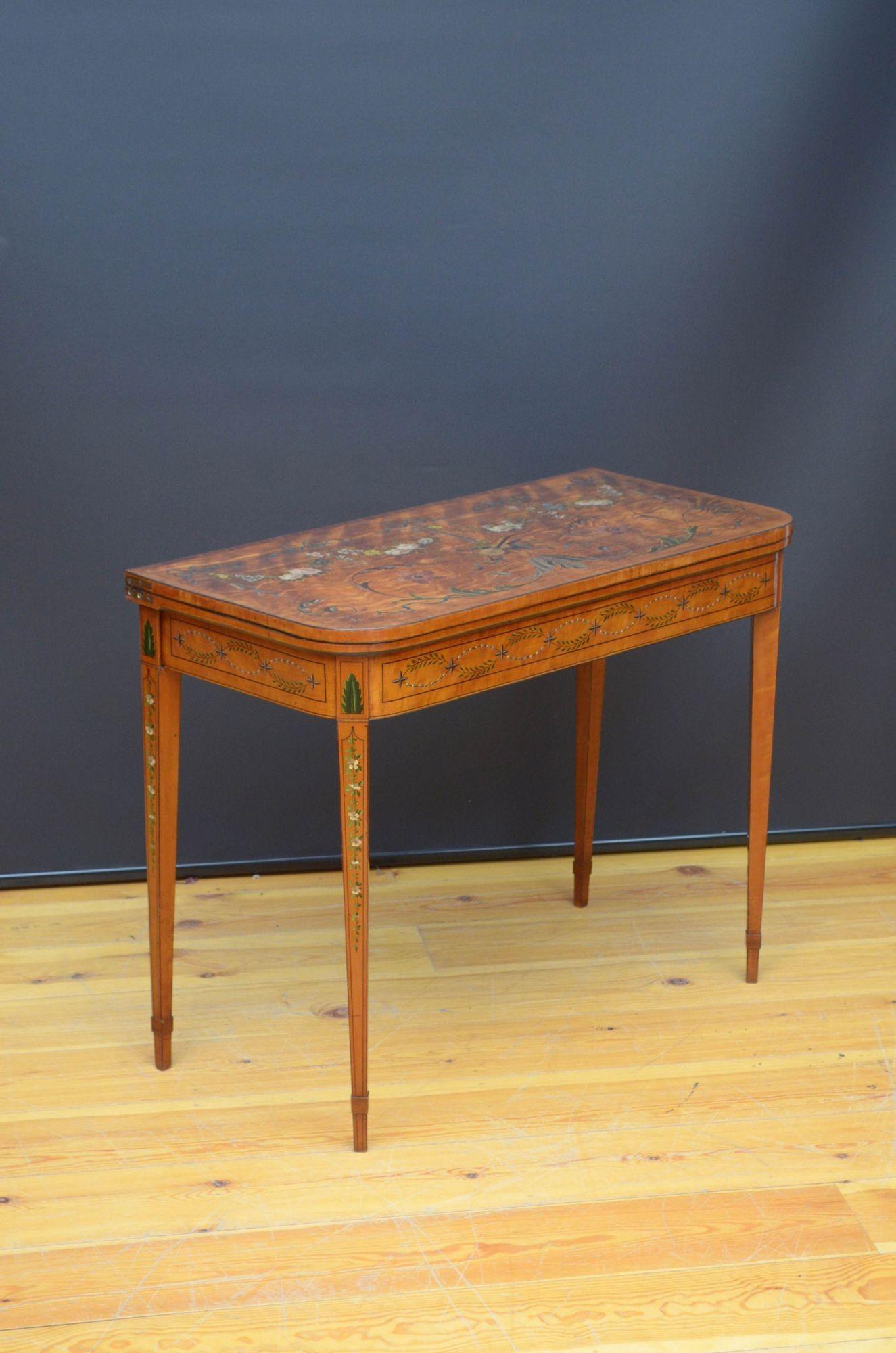 Sn4767 Outstanding Sheraton period, George III, D card table in satinwood, having crossbanded and string inlaid top with beautifully painted floral swags, leafy scrolls, harebells and bows, the top opens to reveal newly lined baize game surface, all