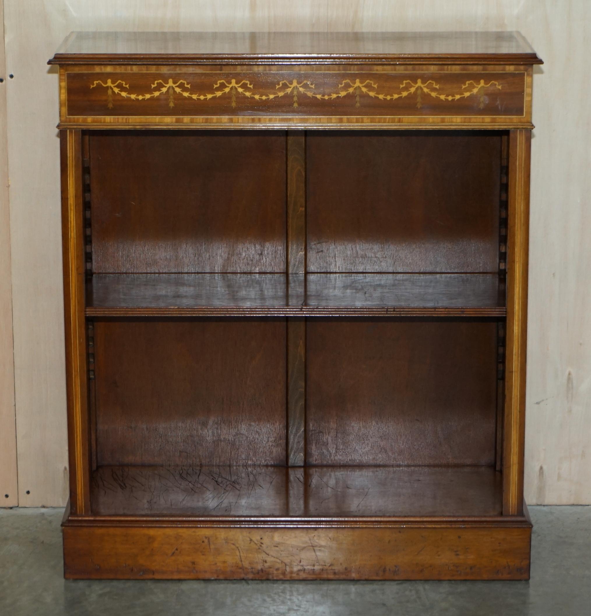 We are delighted to offer for this lovely Burr Elm, Walnut inlaid, Sheraton Revival style dwarf open library bookcase

A very good looking well made and decorative piece, the shelf is height adjustable and or removable so it can be adjusted to