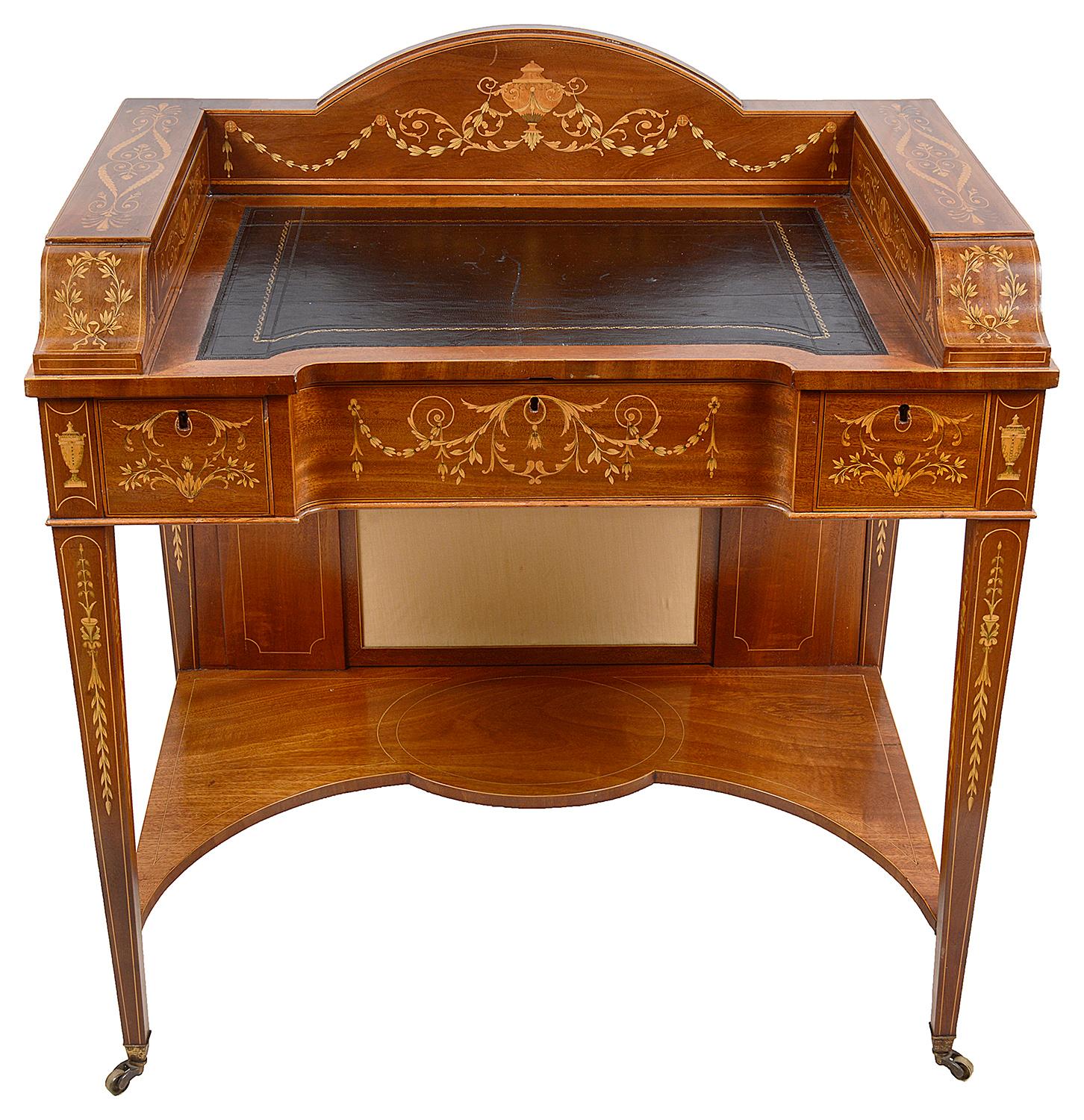 A fine quality late 19th century mahogany inlaid, Sheraton revival ladies writing desk. having drawers and compartments to the superstructure, an inset leather writing surface, three frieze drawers, wonderfully fine boxwood inlaid decoration,