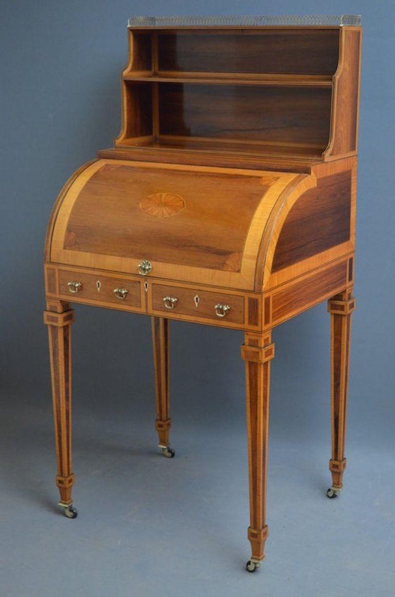 Sn3169 Exceptional Sheraton revival - Edwardian rosewood bureau - writing table, having original pierced, brass gallery above 2 waterfall shelves, batwing inlaid cylinder fall which opens to reveal pigeon holes, small drawers and adjustable tooled