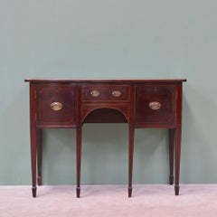 Sheraton revival serpentine mahogany sideboard