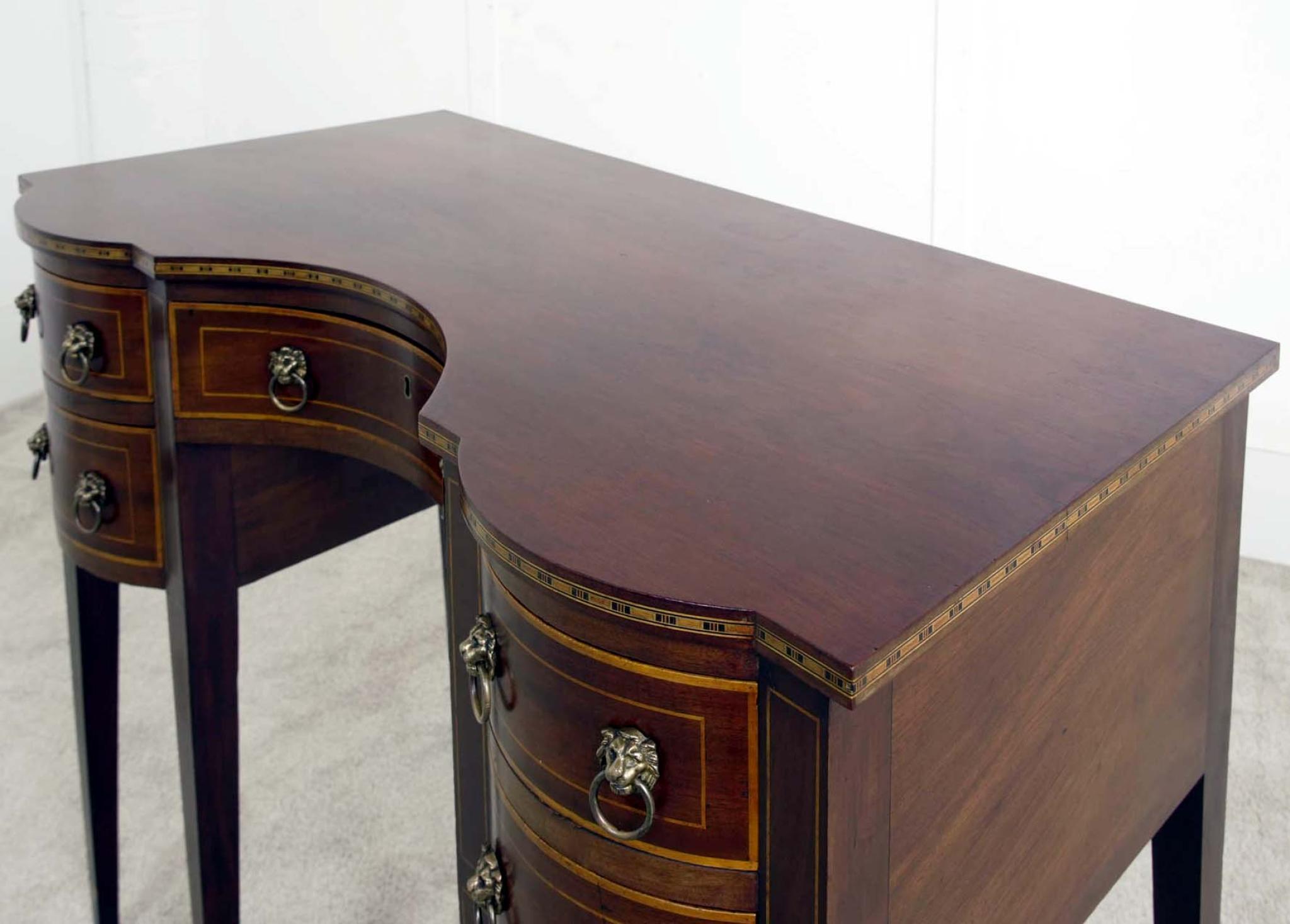 You are viewing an elegant Sheraton Revival sideboard in mahogany Such a refined shape with serpentine form
Circa date 1880
Brass ring pull handles with backplates in a classical style,
enhancing its period charm
Mahogany construction with boxwood