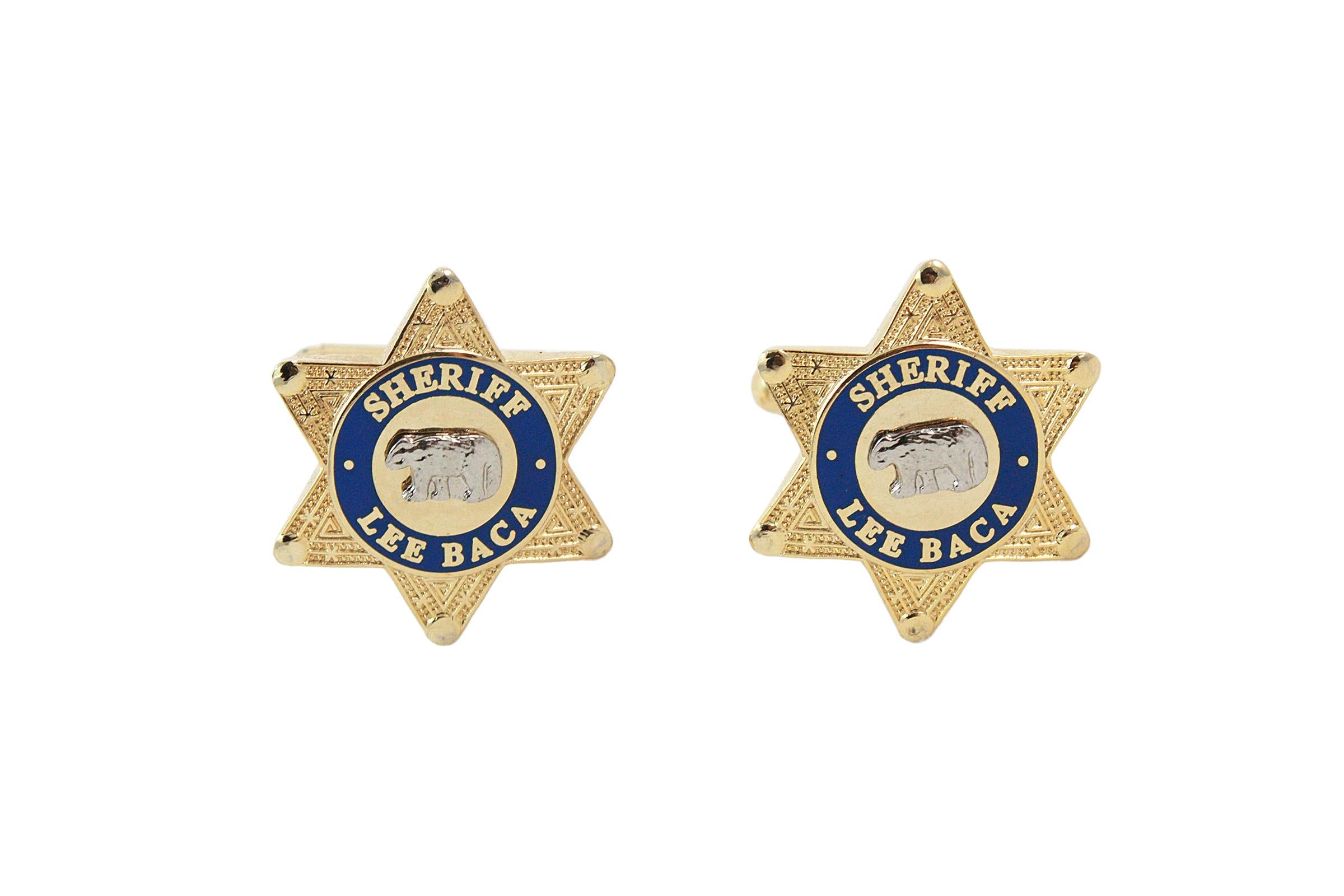 Gold tone metal star-shaped cufflinks
Sheriff Lee Baca 
Gold bear design 
Unknown designer

Sheriff Lee Baca was the acting Sheriff in Los Angeles between being sworn in in 1998 and 2016 