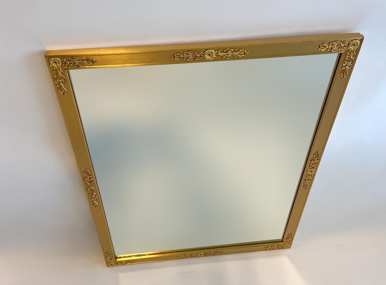 Sherle Wagner filigree mirror small in gold vintage condition gold plate over brass or bronze construction Wired for vertical hanging. From the Sherle Wagner International Heritage Collection. Custom sized 27.25