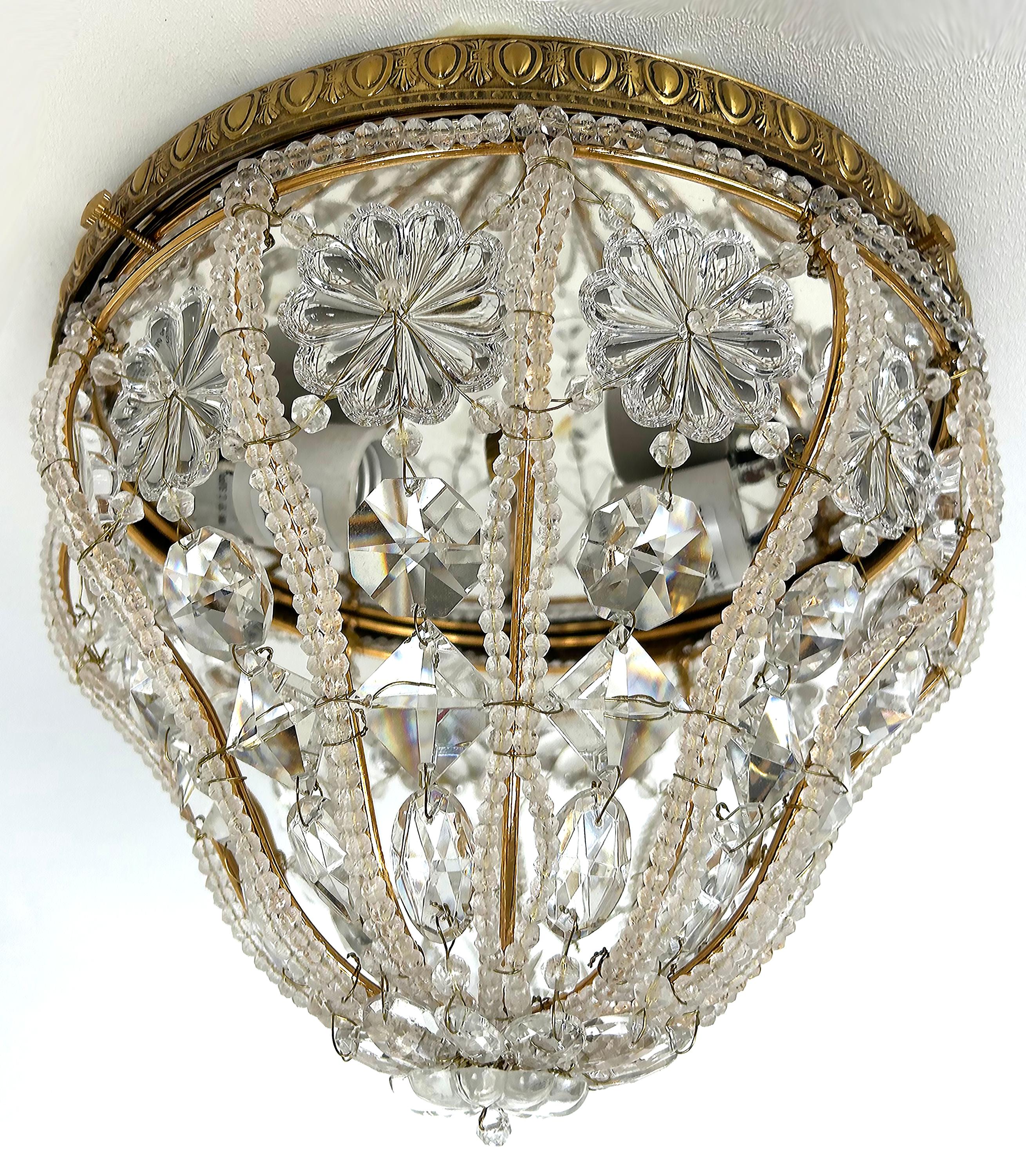 Sherle Wagner Luminaire Flush Mount Crystal Beaded Light Fixture

Offered for sale is a flush mount light fixture by Sherle Wagner a crystal beaded cage over brass. The fixture has a porcelain socket attached to the flush-mount canopy that has a