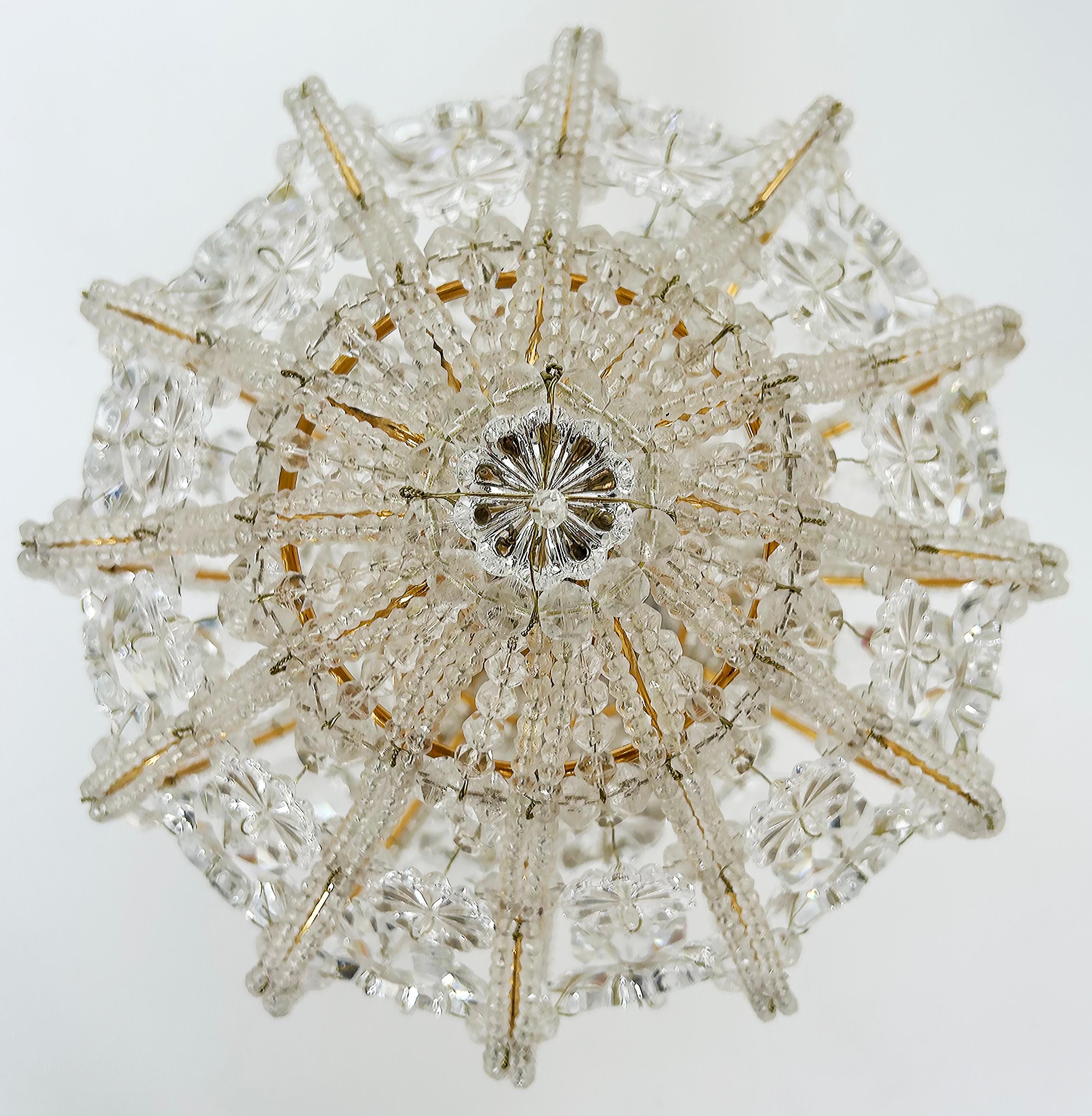 Sherle Wagner Luminaire Flush Mount Crystal Beaded Light Fixture 

Offered for sale is a flush mount light fixture by Sherle Wagner for Luminaire in a crystal beaded cage form over brass. The fixture has a porcelain socket.  The canopy is fully