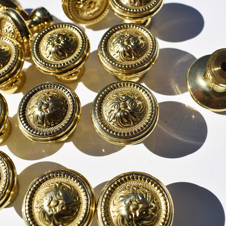 Set of 16 Sherle Wagner Beaded Rococo cabinet drawer knobs or pulls. These beautiful knobs create an elegant addition to any bathroom or kitchen. Round in shape, each pull is decorated with a beaded outer design. The center of the knobs feature a