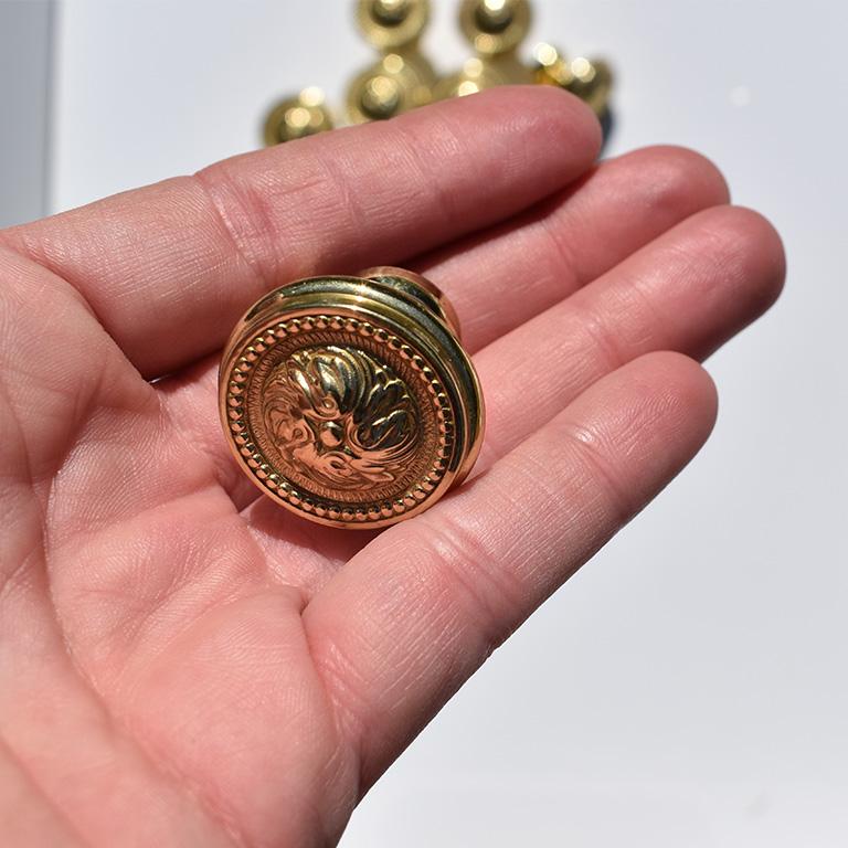 round gold knobs