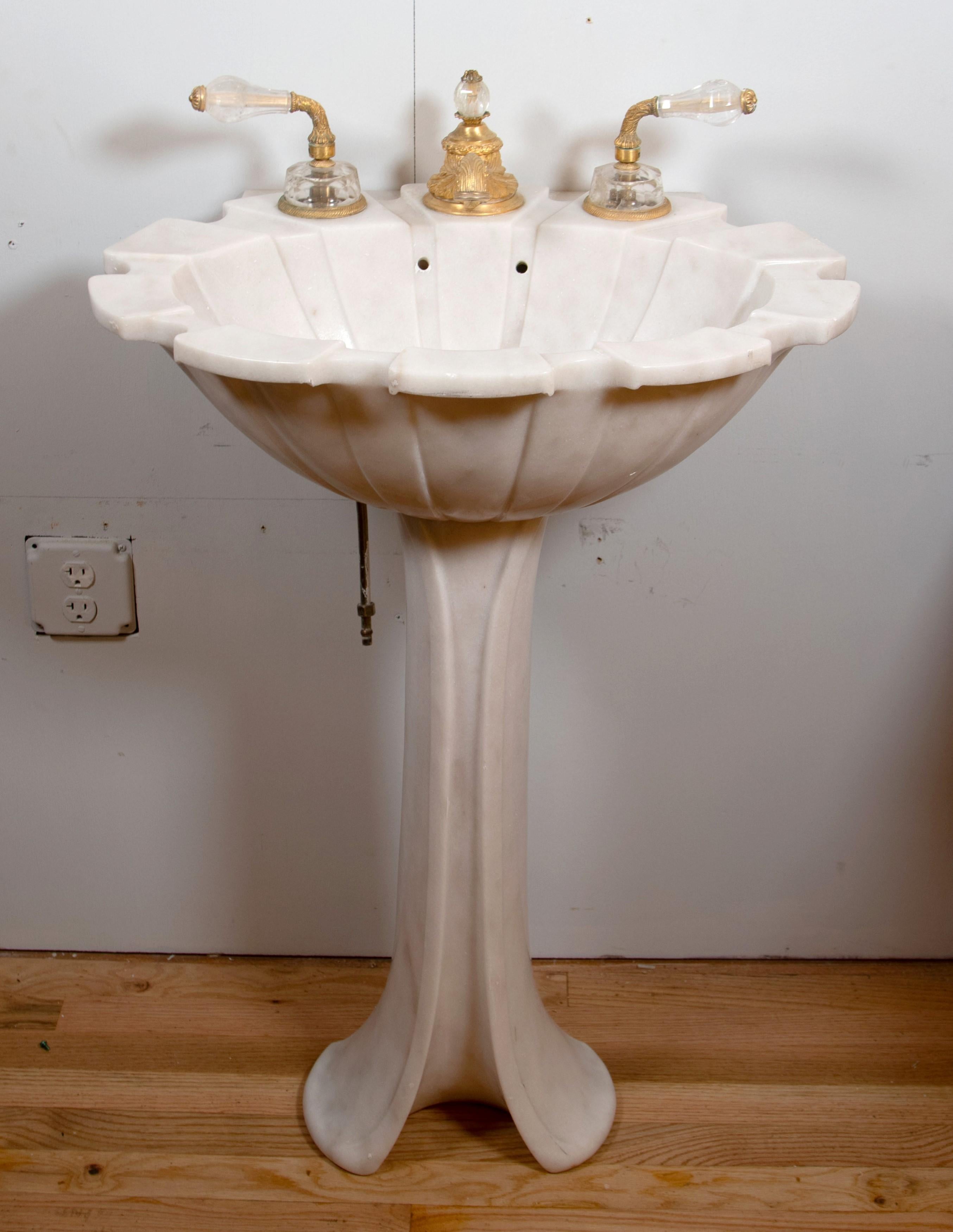 Sheryl Wagner pedestal sink with cut glass and gilt hardware in a white veined marble construction. Good condition with appropriate wear from age. One available. Please note, this item is located in one of our NYC locations.