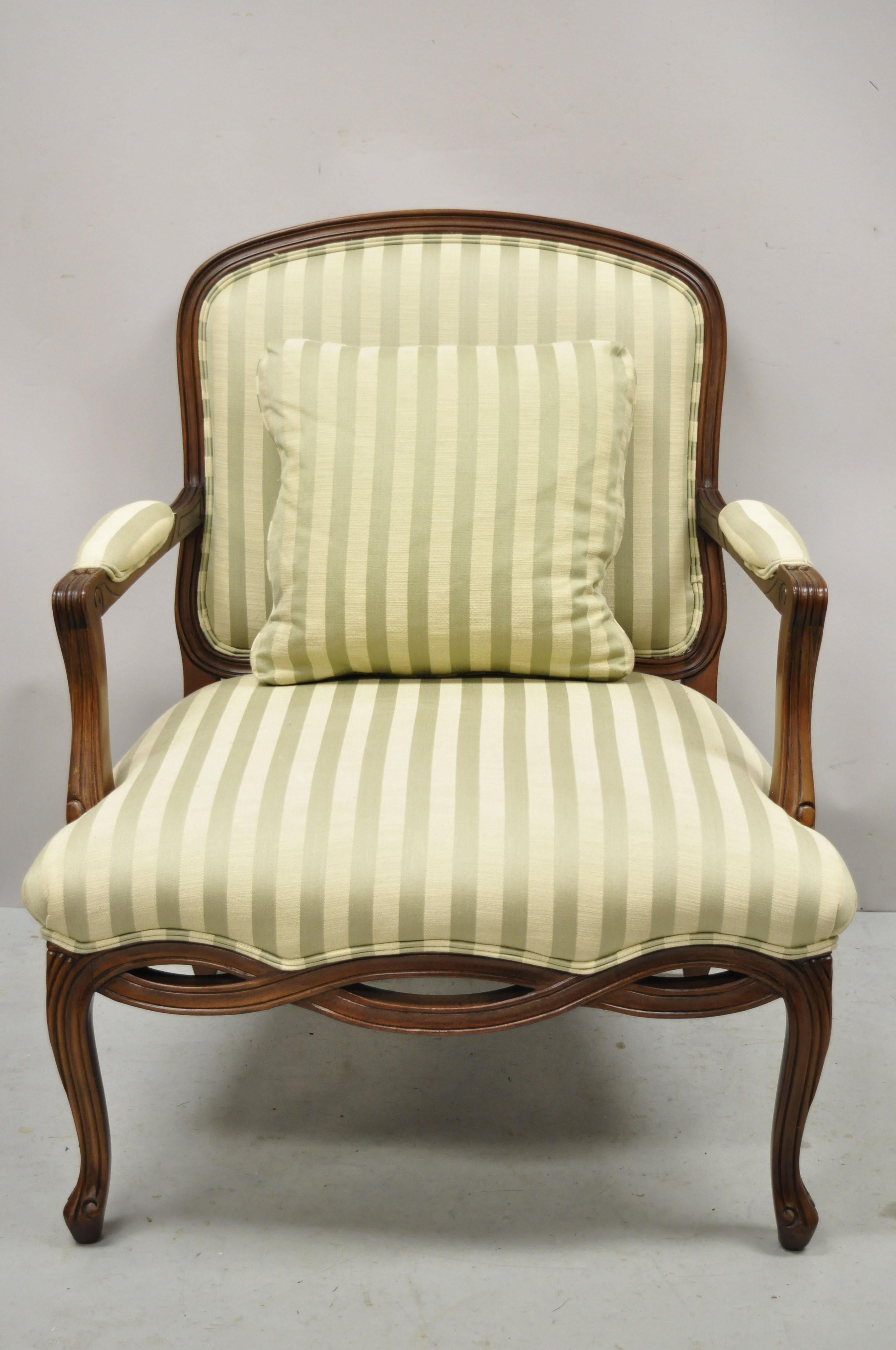 Sherrill French Provincial Louis XV style woven skirt bergere lounge arm chair. Item features green striped upholstery, carved woven skirt, very nice item, great style and form. Measurements: 38