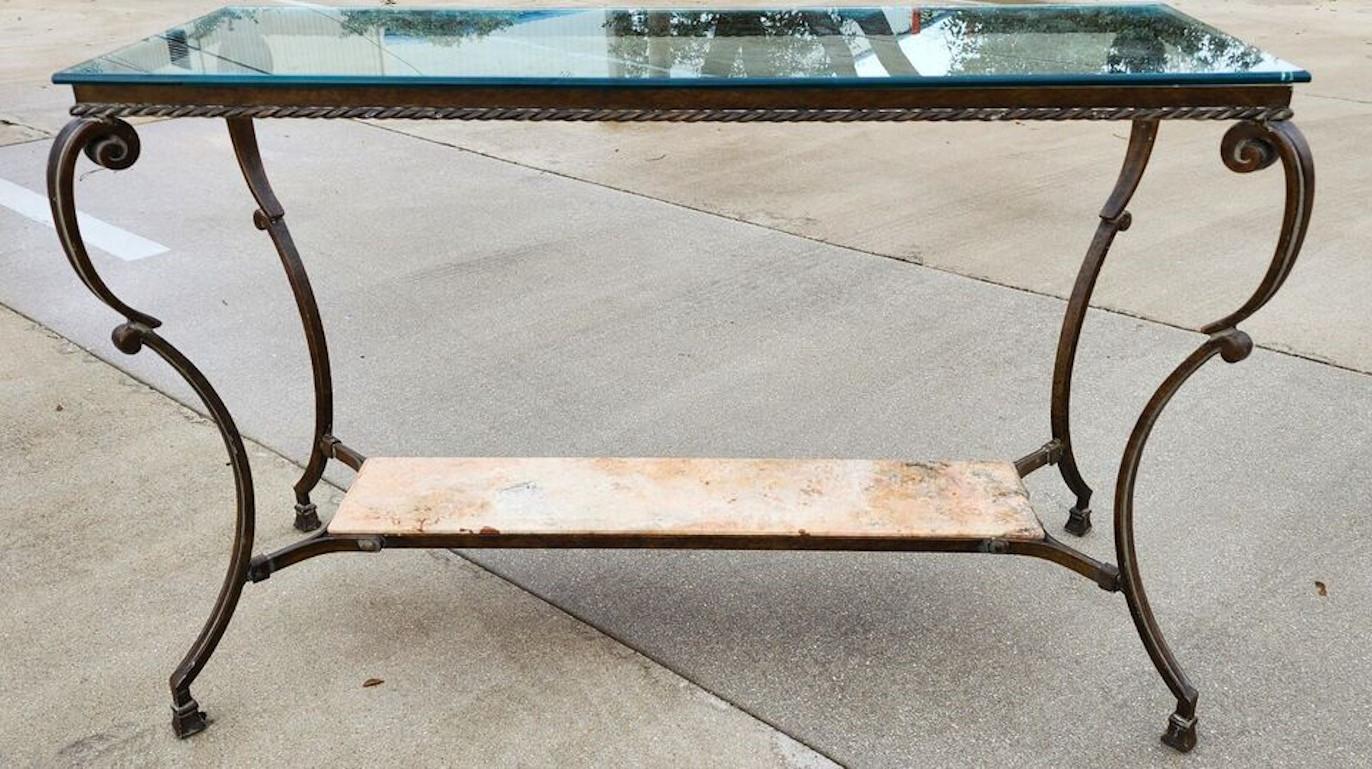 For FULL item description click on CONTINUE READING at the bottom of this page.

Offering One Of Our Recent Palm Beach Estate Fine Furniture Acquisitions Of A
Vintage Patinated Iron with Glass and Marble Shelves Console Table 

Approximate