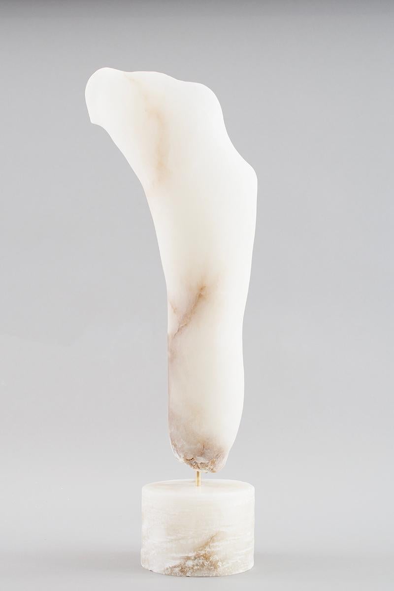 Presented is a one-of-a-kind single edition sculpture by female sculptor artist Sherry Rossini. Hand carved by the artist from alabaster stone that was imported from Italy. The base also is carved from the same imported alabaster stone. The
