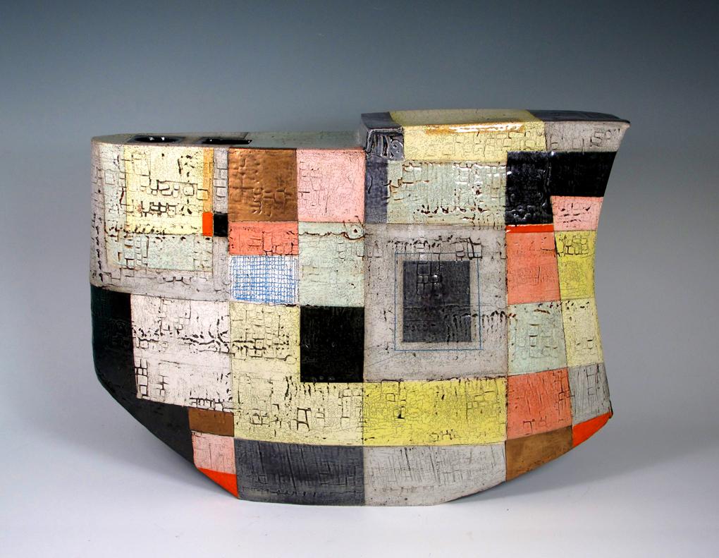 'Mosaic Sky' by Contemporary American artist, Sheryl Zacharia. Ceramic, 15 x 22 x 7 in. This sculpture incorporates a bold palette of colors in pink, yellow, brown, mint green, red, white, grey, and black. 

Zacharia's table-sized ceramics are a