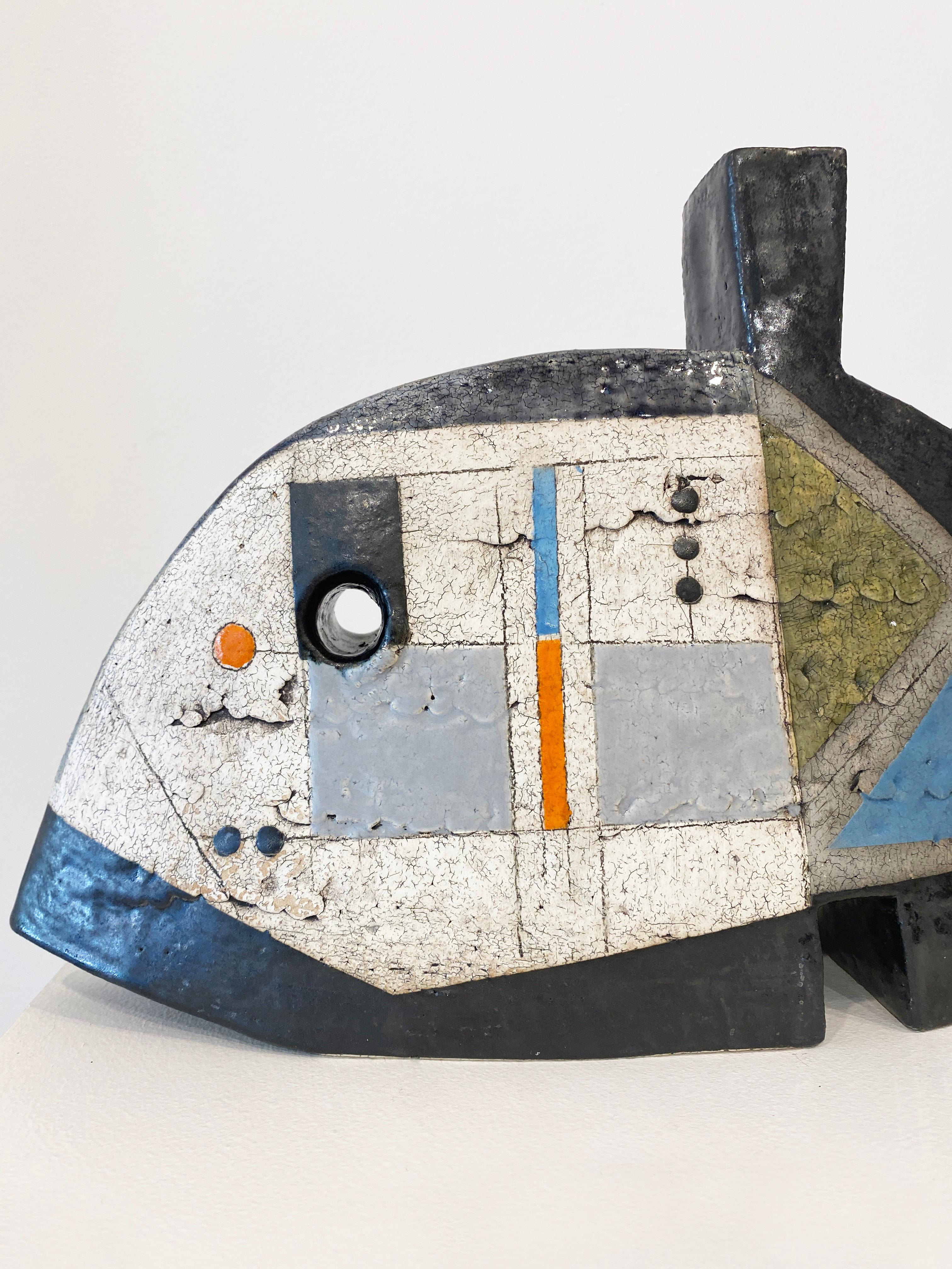 'Seaworthy' by Contemporary American artist, Sheryl Zacharia. Ceramic, 10 x 15.5 x 4 in. This sculpture incorporates a bold palette of colors in orange, blue, green, grey, white, and black. 

Zacharia's table-sized ceramics are a conversation