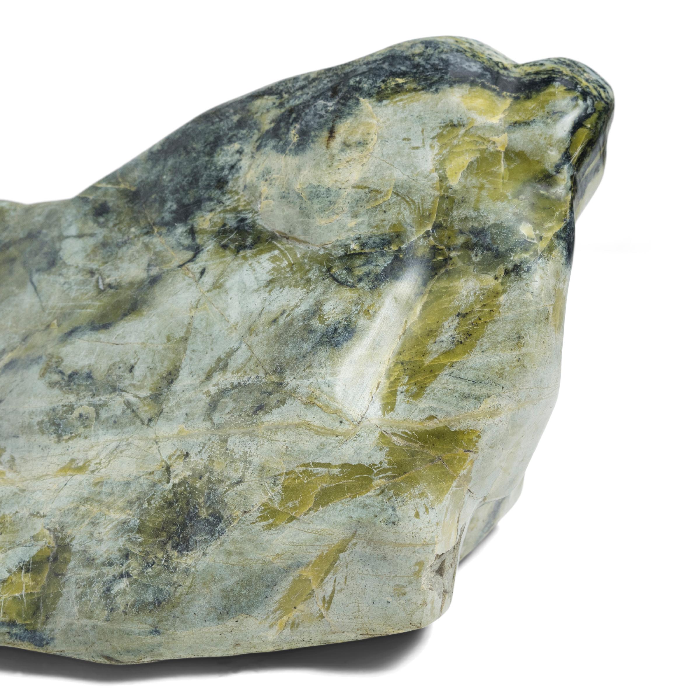 Following the sculpted form, marbled coloring, and natural veining of this one-of-a-kind stone can be deeply meditative. Viewed as a source of beauty and creativity, Chinese scholar-artists would decorate their studios and gardens with similar