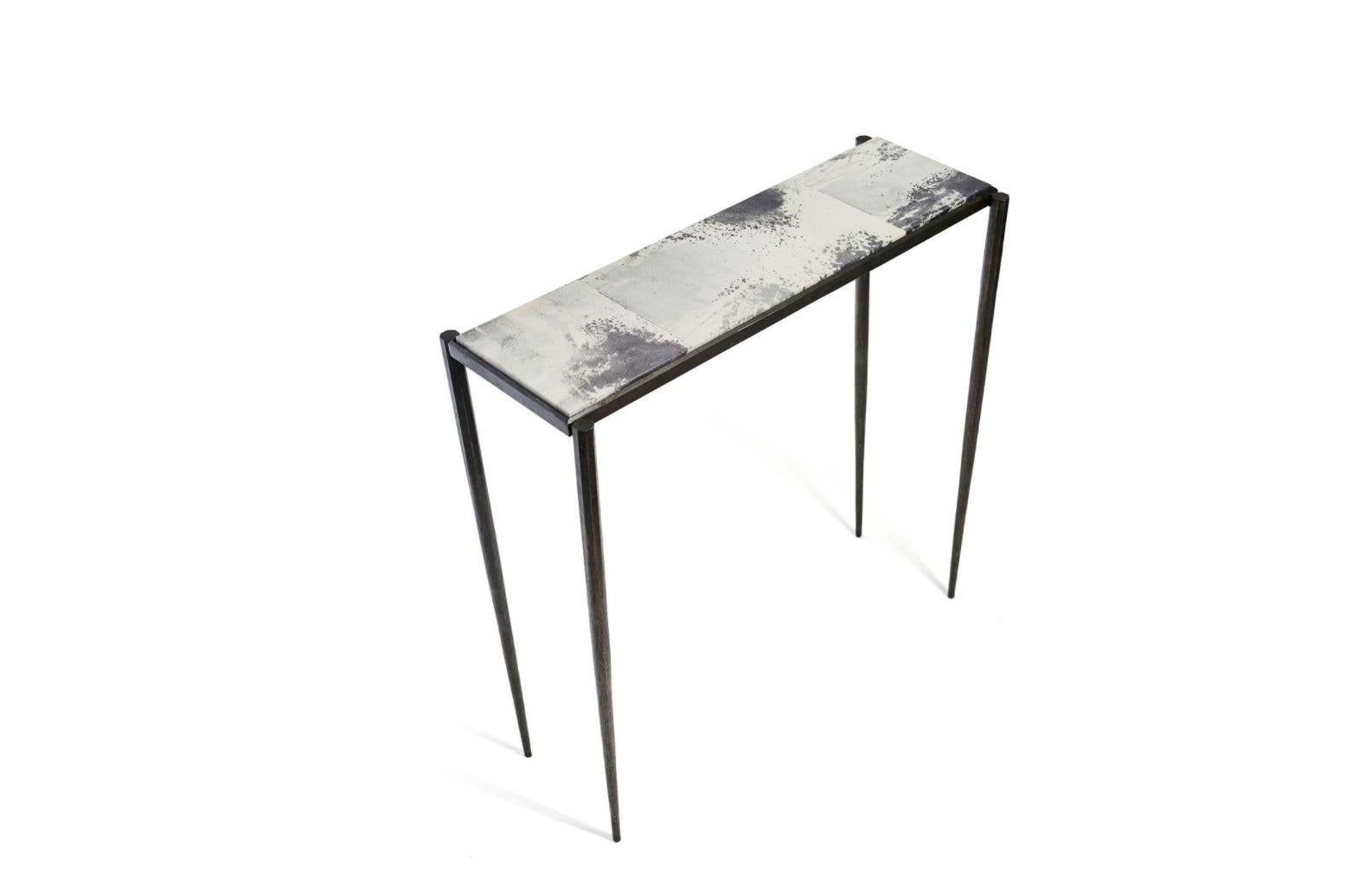 Shibori Small Table by Christina Z Antonio
Dimensions: D77 x W23 x H77 cm
Materials: HAND PAINTED GOAT SKIN PARCHMENT, HAND FORGED STEEL LEGS

Christina Z Antonio is a multi-disciplinary Artist and Designer. A trained master-craftsman in