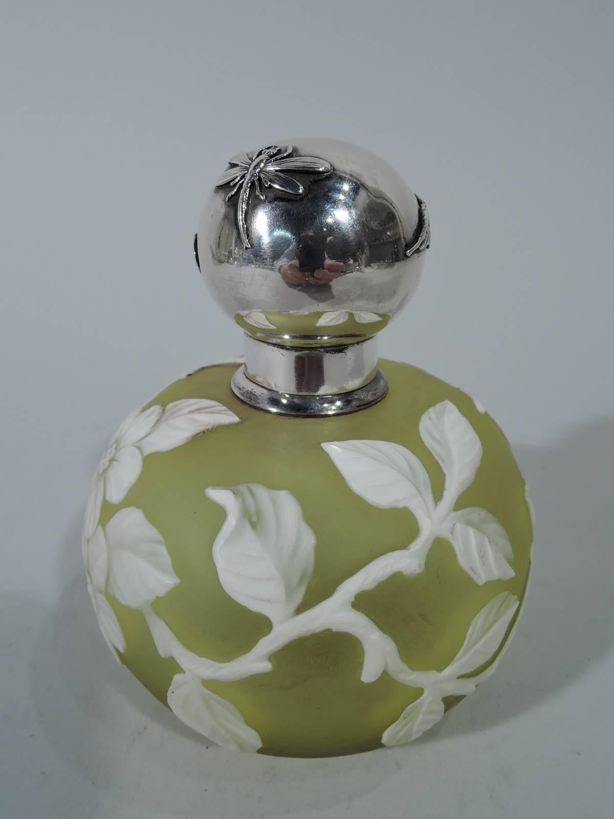 English cameo glass perfume with American sterling silver collar and cover. Globular with white blossoming branch on matte yellow ground. Threaded ball cover with applied Japonesque ornament: dragonfly, bamboo, and owl. Hallmarked Shiebler, a