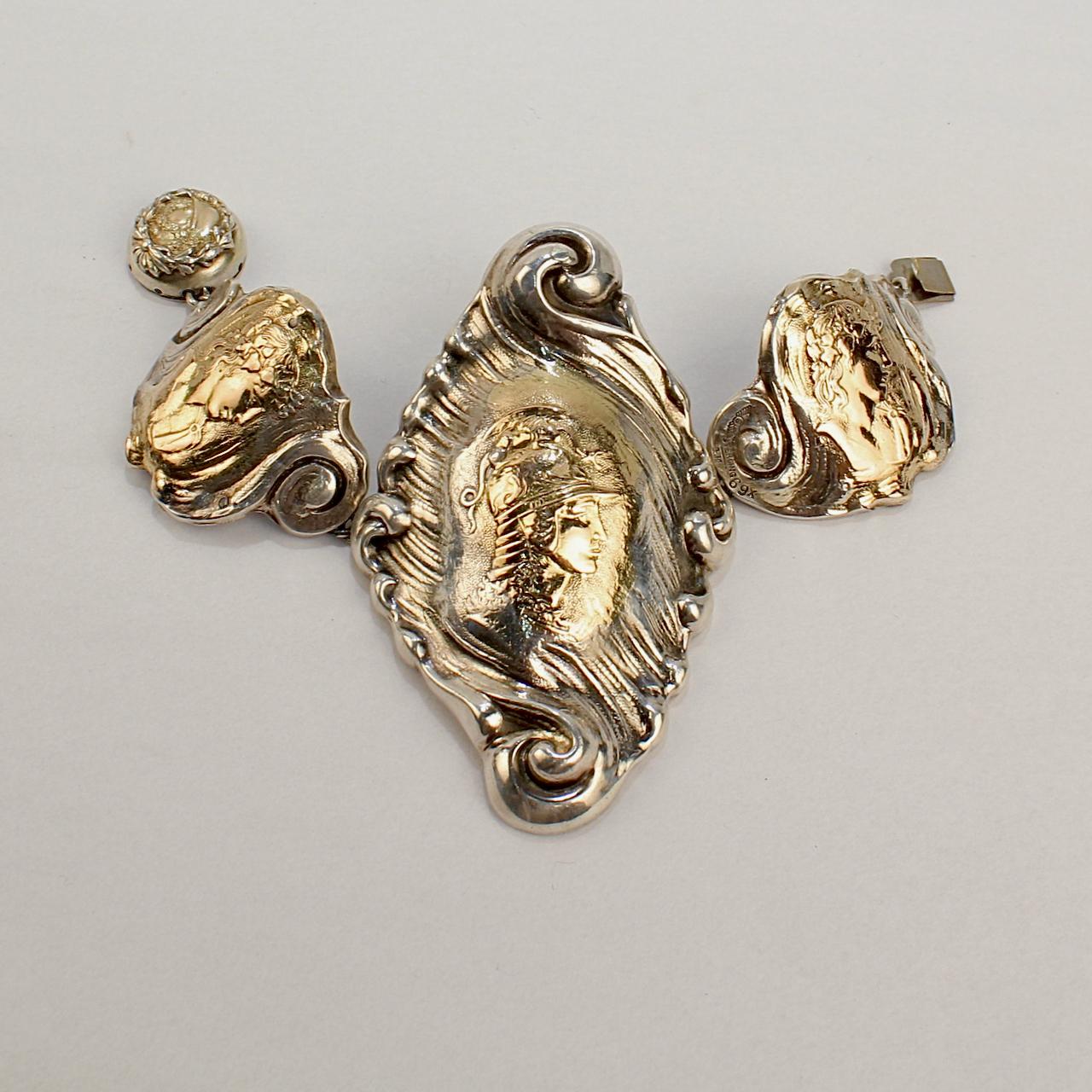 A very fine Shiebler sterling silver and 14k gold Etruscan or medallion bracelet.

The bracelet appears to be comprised of Shiebler buckle and button elements that were fashioned with a chain into a bracelet by a jeweler. 

Consisting of 4 separate
