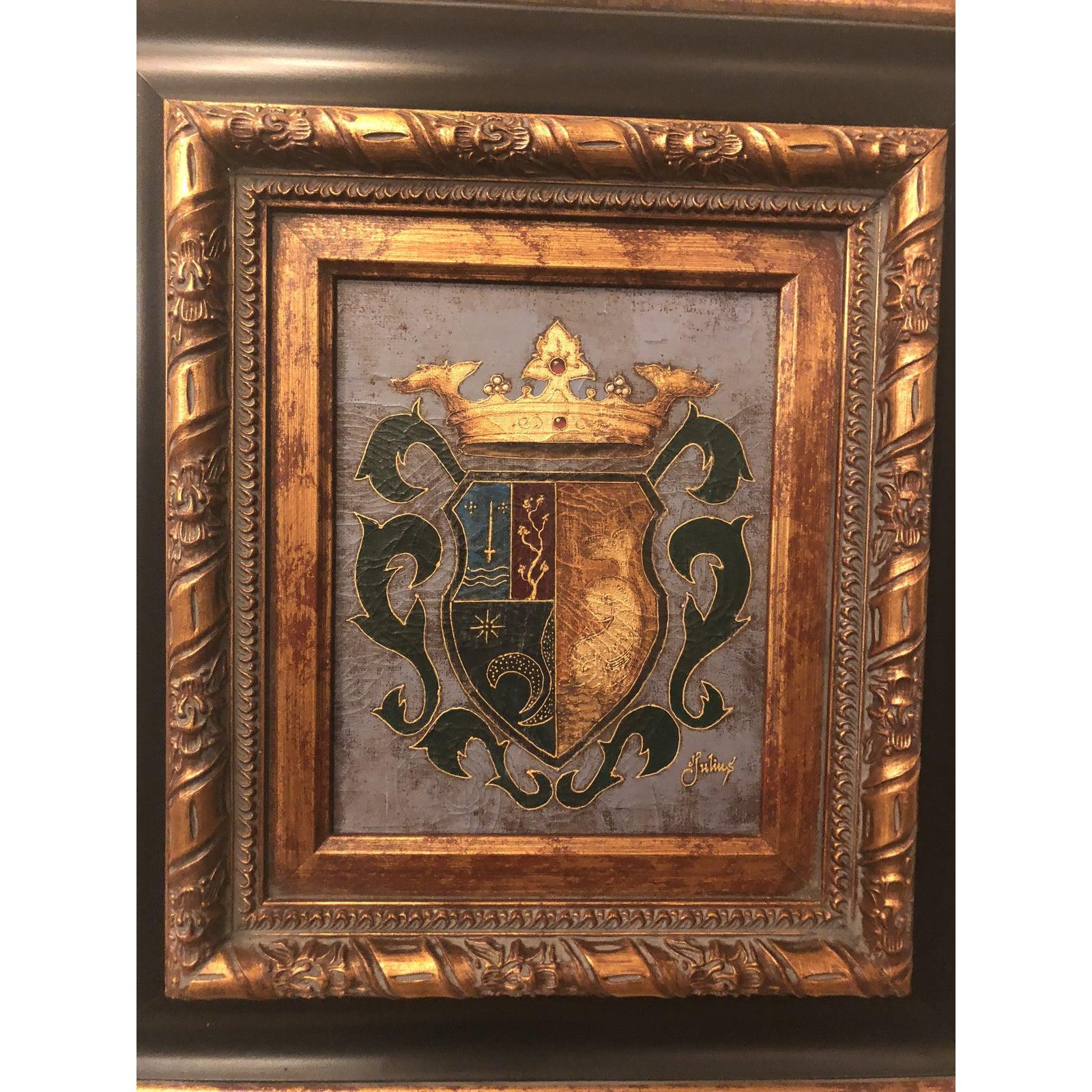 This is an oil on canvas painting depicting a shield and crown. The black and gold custom frame adds sophistication and class to this royal piece. 
The painting is signed by artist Julius 

Dimensions:
Framed 21