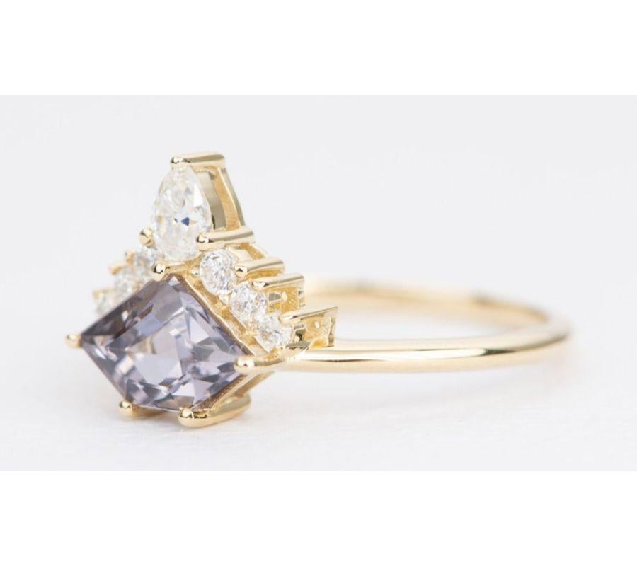 â™¥  Solid 14K yellow gold ring set with a shield shape spinel in the center, then flanked by a half halo of sparkly moissanites to form a headress for the beautiful center stone
â™¥  This ring is made in a low-profile style so it lays directly on