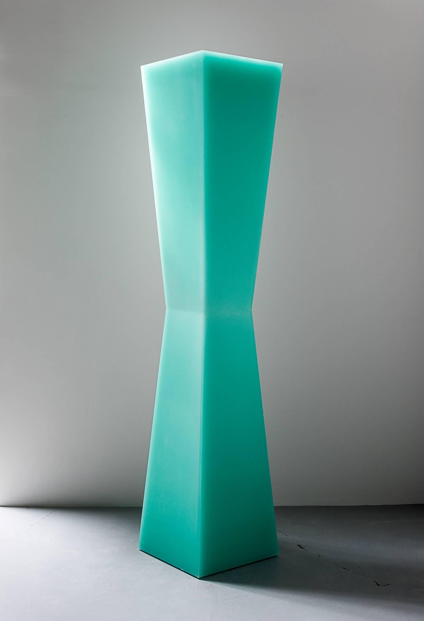 This column uses Facture Studio's shift style to transition seamlessly from a deep opaque to water clear green over a white core. The exterior facets are sanded to a buttery smooth finish. This column plays with light and transparency to create a