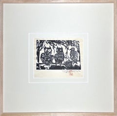 Three owls on tree branch