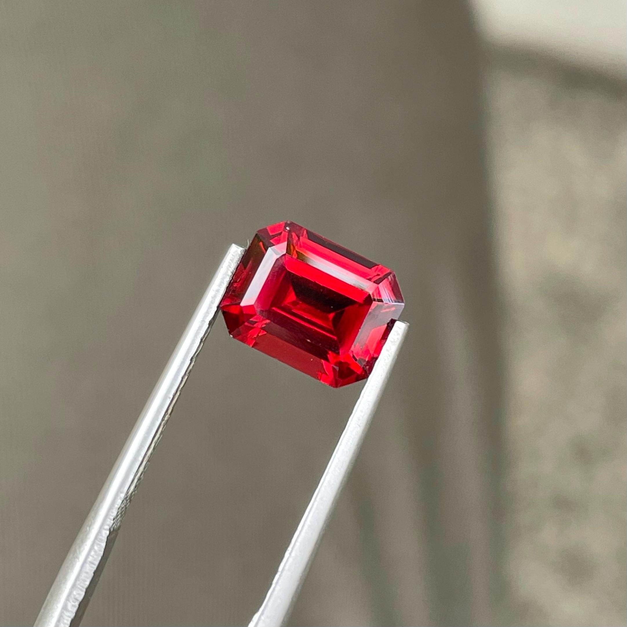 Modern Shimmering Red Rhodolite Garnet 3.35 carats Emerald Cut Gemstone from Madagascar For Sale