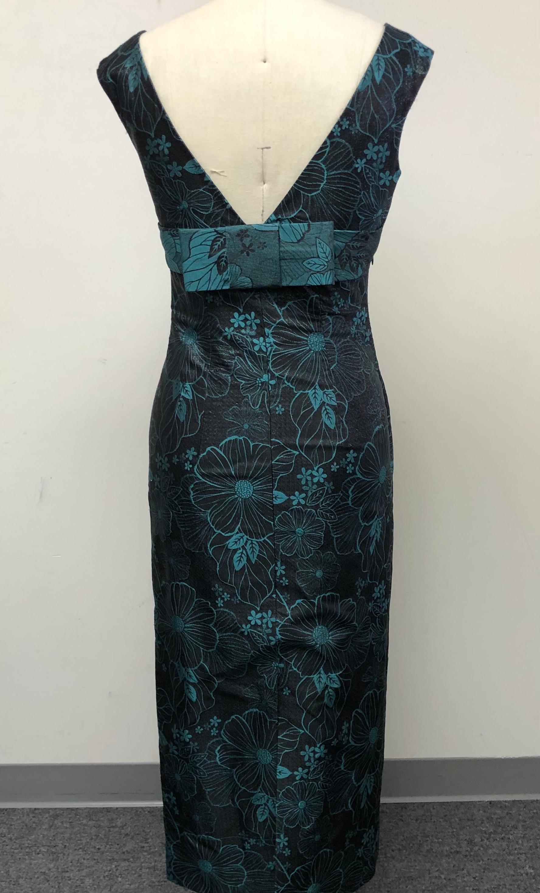 Vestido negro brillante y turquesa con cuello en V y lazo en la espalda en venta 1