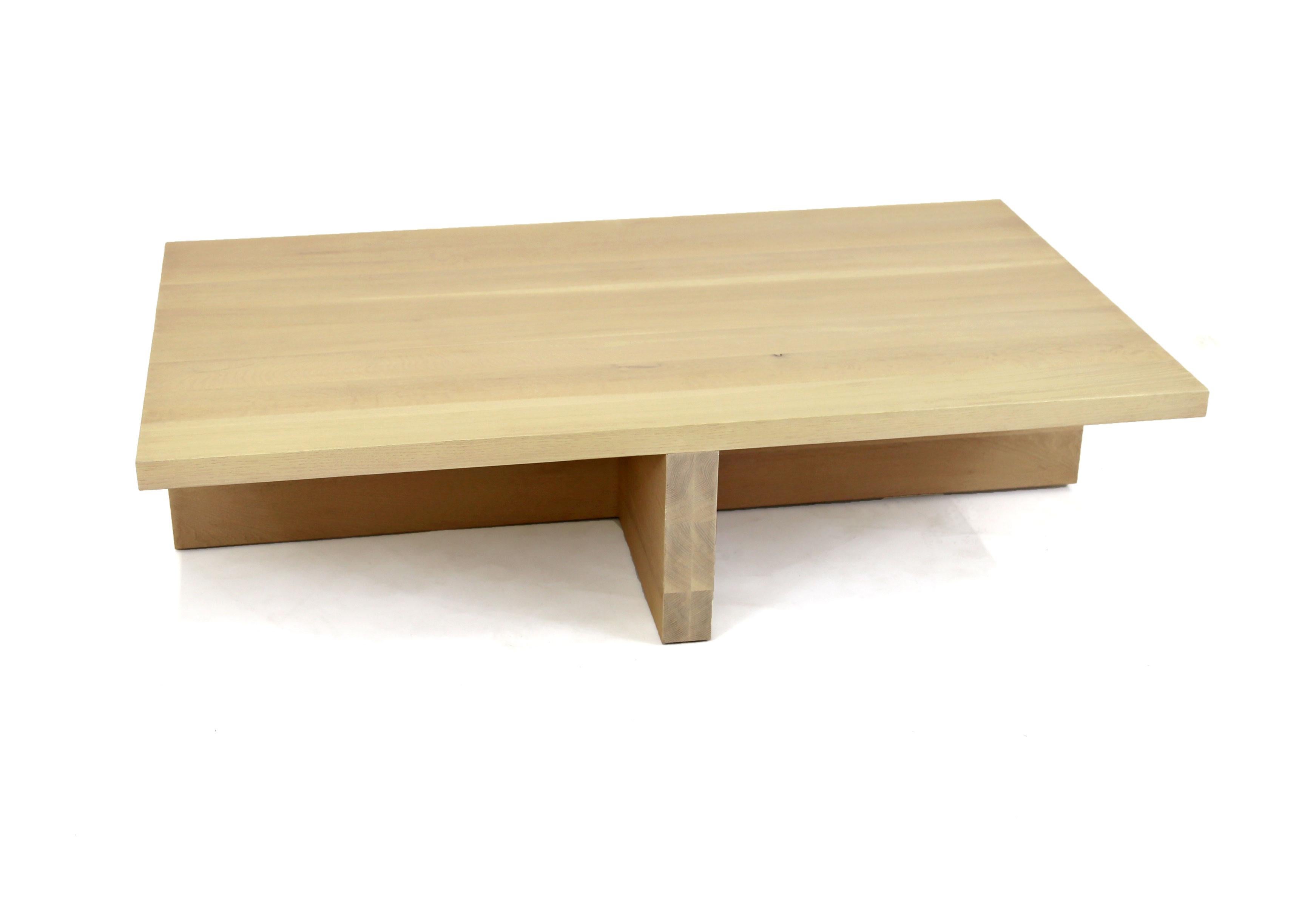 A simple hardwood coffee table that is minimal in design and allows the white oak grain to speak for itself. Each piece is custom-made to order in our Brooklyn workshop. 
Each piece will vary considering the unique grain patterns of real wood.