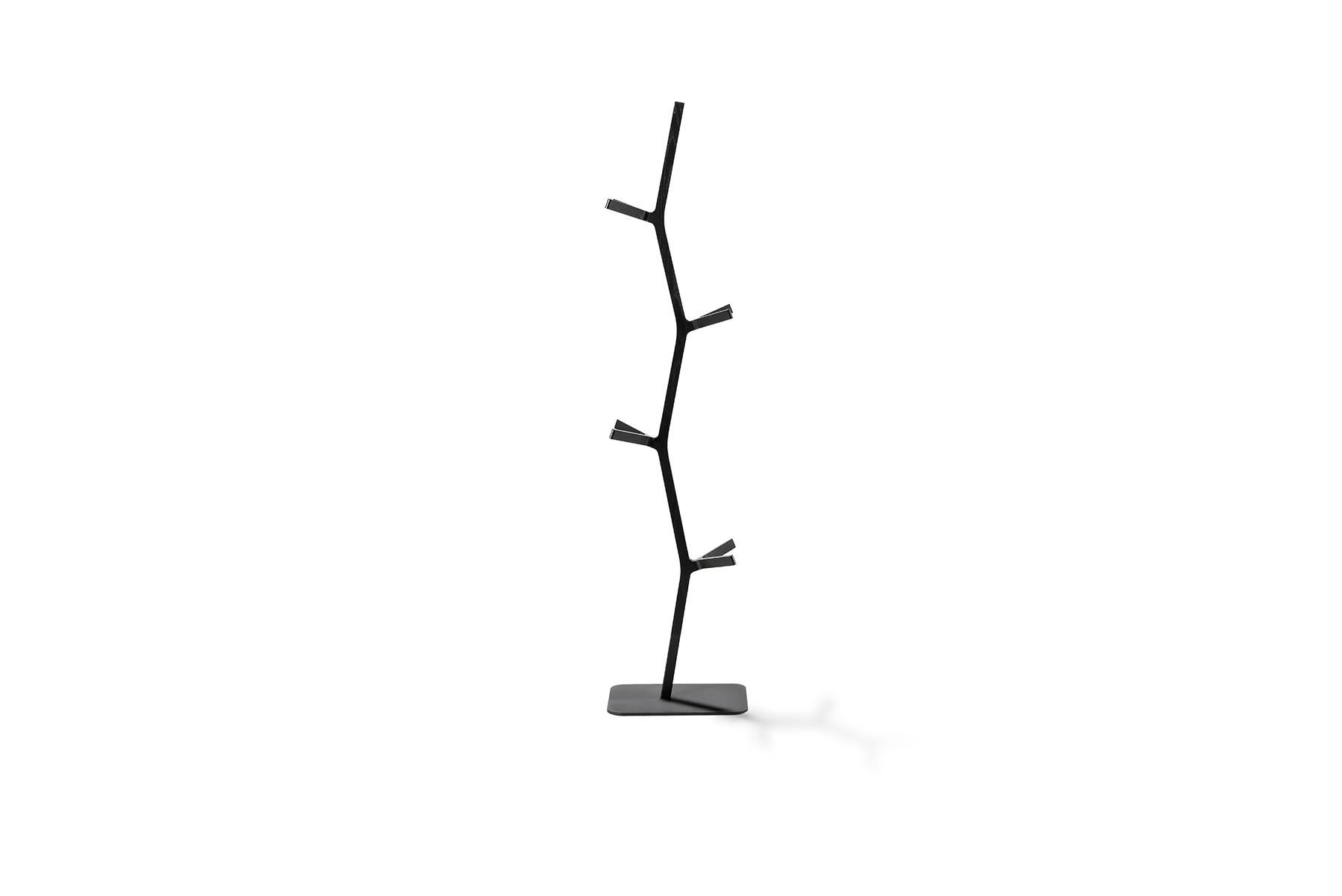 Shin Azumi Nara Coat Stand was designed by Shin Azumi as way to utilise the off cuts from production of the Nara chair. The result is a sculptural object with a graphical silhouette.