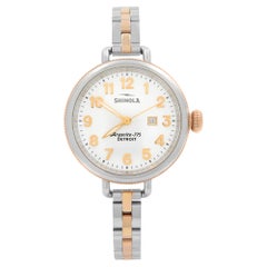 Shinola Birdy Reloj de cuarzo para señora de acero dorado con esfera blanca S0120001100