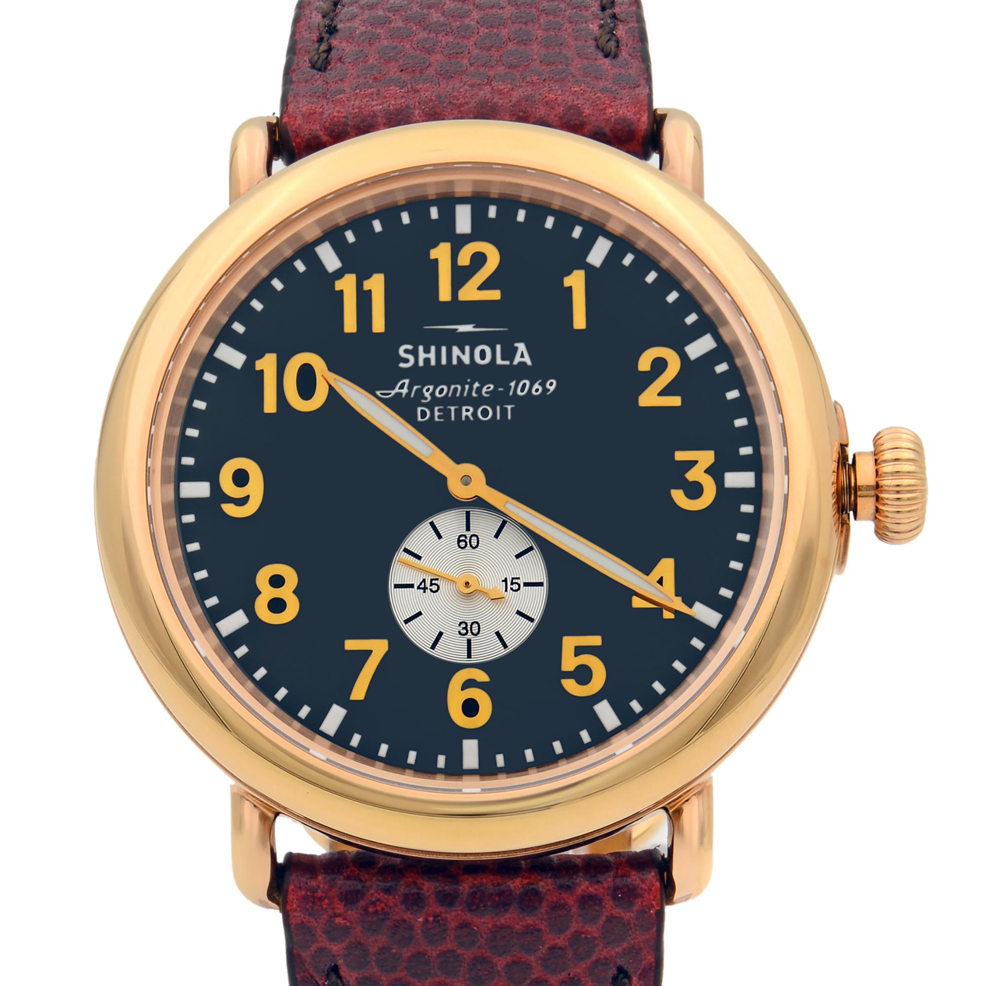 This pre-owned Shinola Runwell  S0110000168 is a beautiful men's timepiece that is powered by quartz (battery) movement which is cased in a stainless & plated metal case. It has a round shape face, small seconds subdial dial and has hand arabic