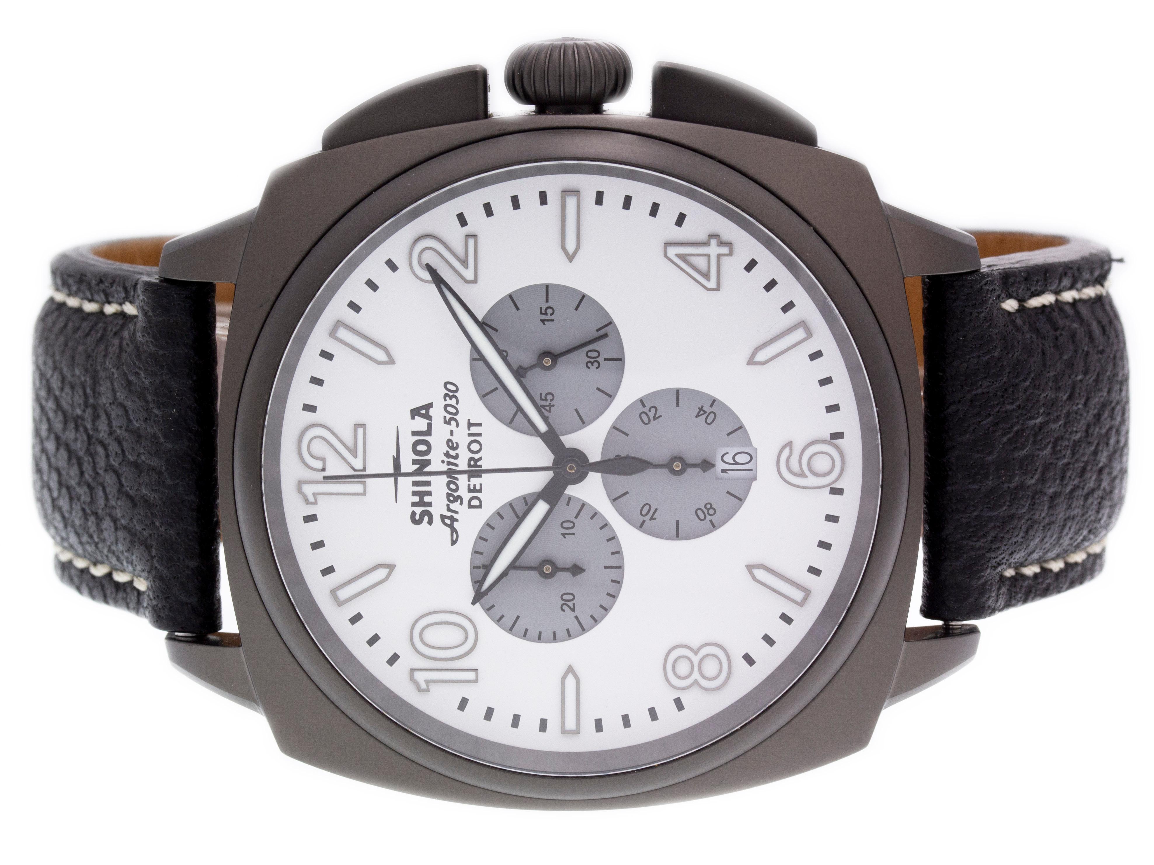 PVD Steel Shinola The Brakeman Chrono watch with a 46mm case, white dial, and black leather strap with tang buckle. Features include hours, minutes, seconds, date, and chronograph. Comes with a Deluxe Gift Box and 2 Year Store