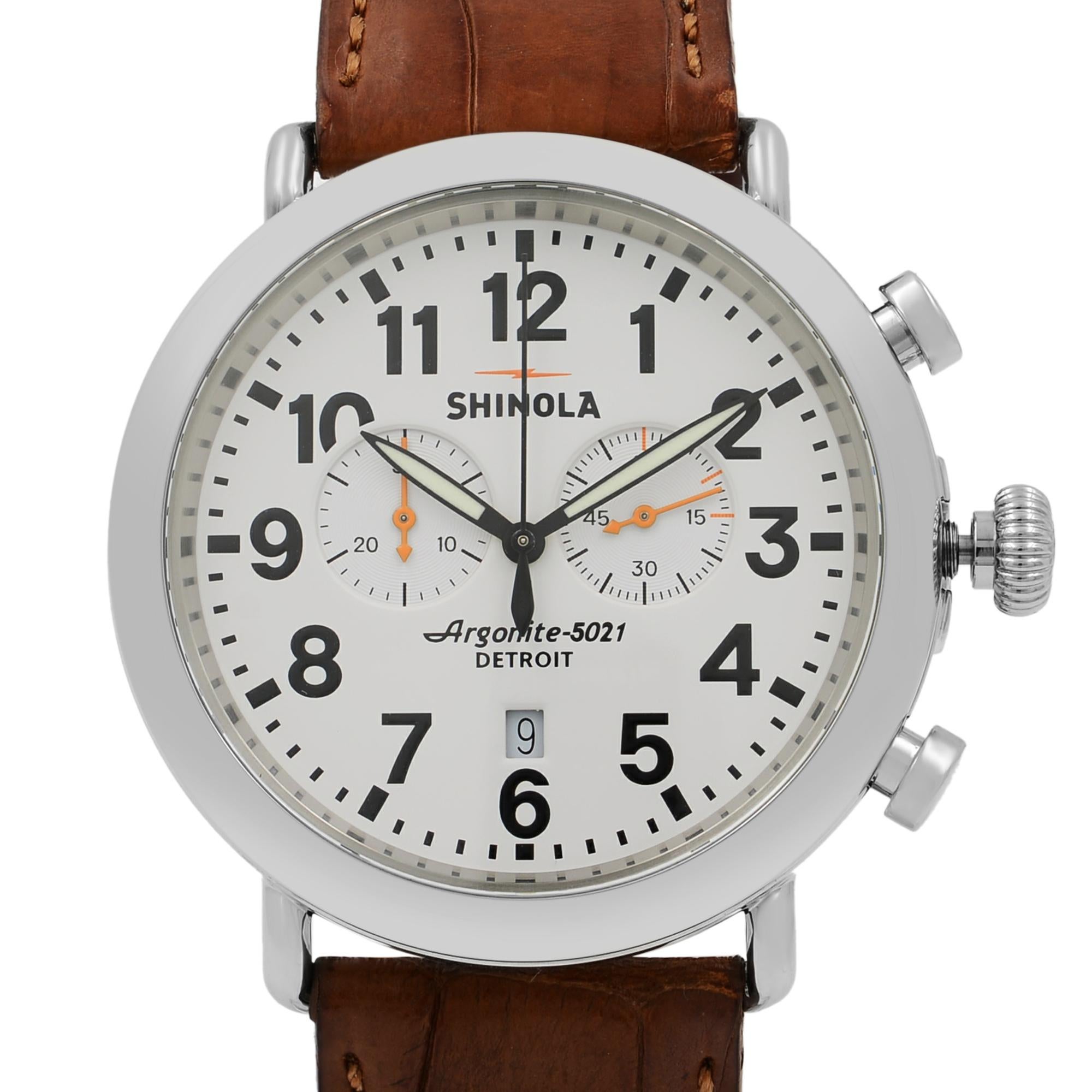 This pre-owned Shinola The Runwell 10000045 is a beautiful men's timepiece that is powered by quartz (battery) movement which is cased in a stainless steel case. It has a round shape face, chronograph, date indicator, small seconds subdial dial, and