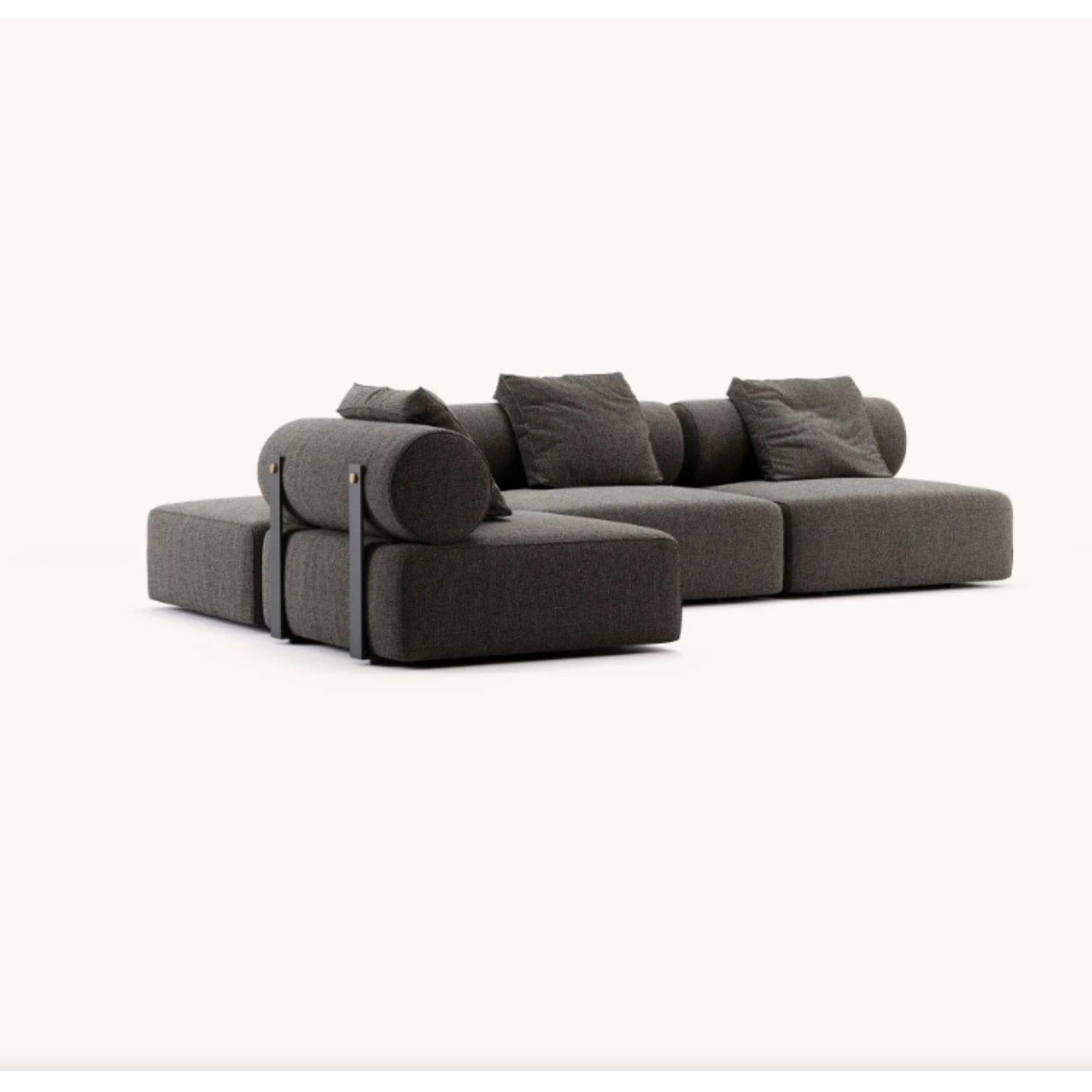 Shinto sofa by Domkapa
Materials: Fabric (Helmand 53), black texturized steel, gold brushed stainless steel. 
Dimensions: W 302 x D 162 x H 82 cm.
Also available in different materials.
with 3 pillows included in the same fabric as the