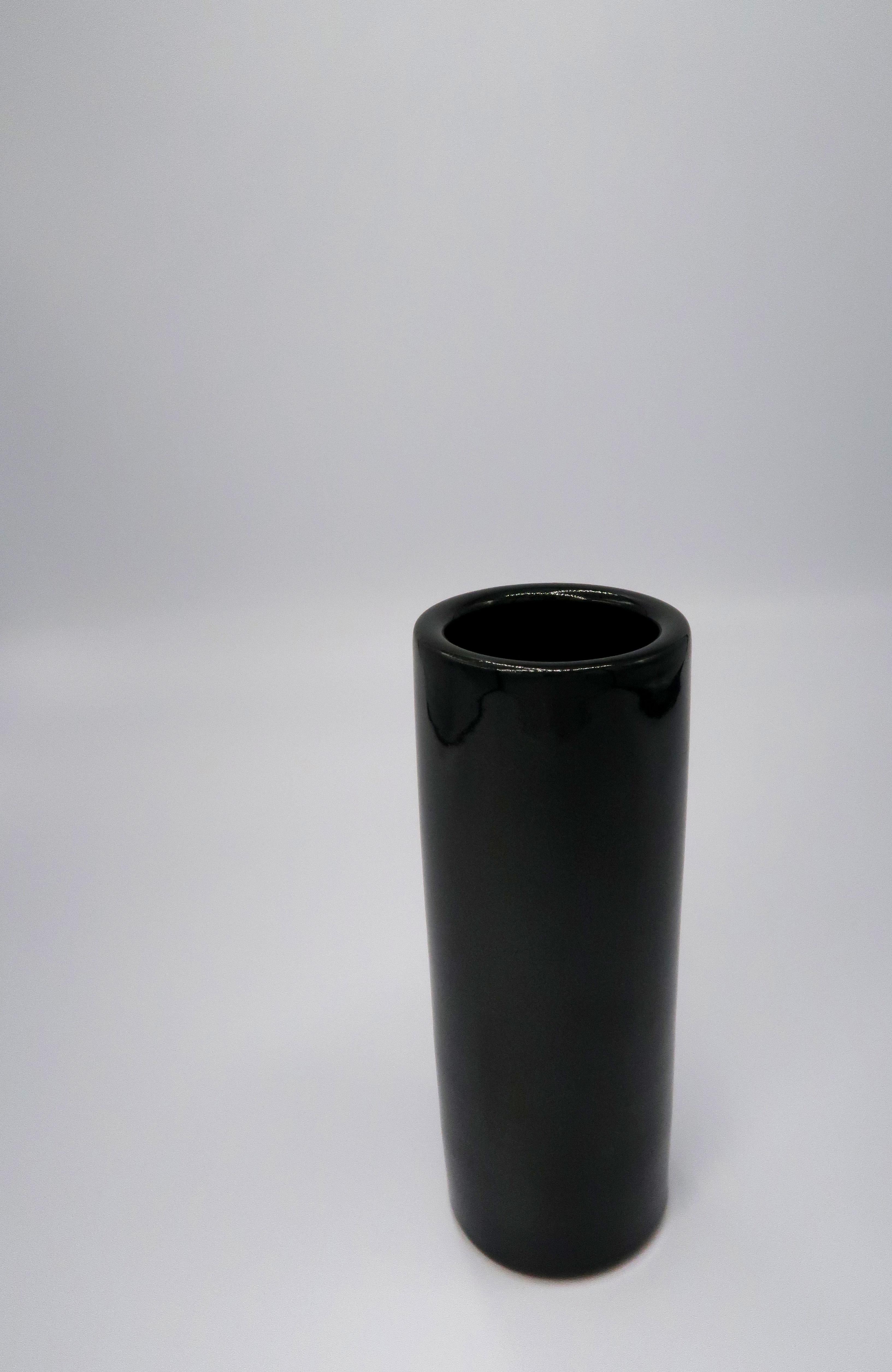 Classic and simplistic tubular handmade ceramic Scandinavian midcentury modern vase with shiny black glaze on the exterior and interior. Manufactured on the small Danish of Bornholm by Søholm in the 1960s. Model 3731-3. Stamped on the bottom on