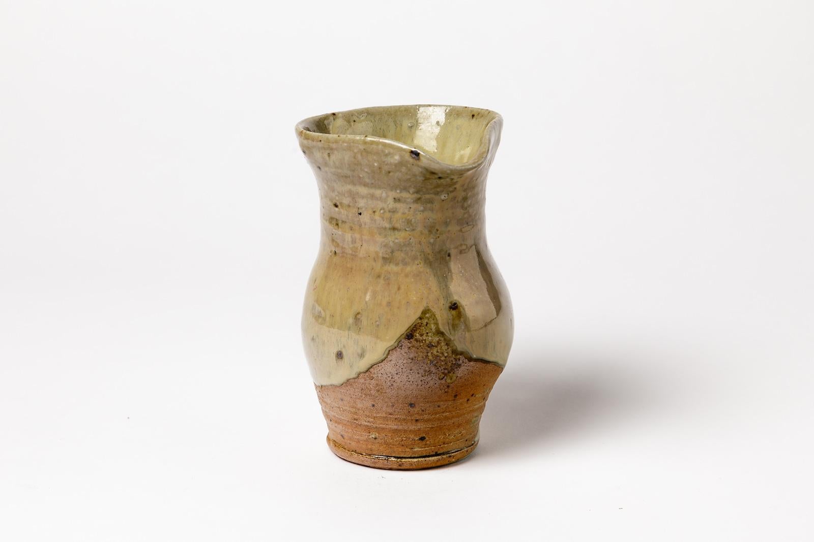 La Borne, 1970

Handmade stoneware ceramic pitcher.

Shiny brown ceramic glaze color.

Dimensions: Height 13 cm larger 12 cm.