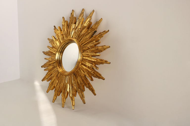 Mid-20th Century Shiny Giltwood Convex Sunburst Mirror, Starburst Carved Sun Mirror, Belgium 60s  For Sale