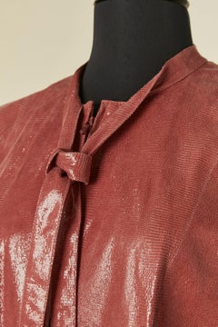 Shiny pink leather top with zip closure and bow tie CHANEL