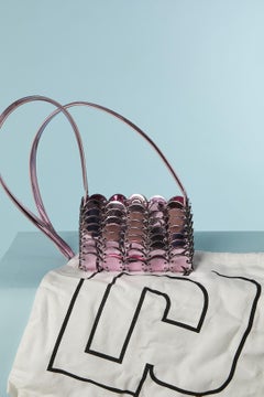 Shiny pink pellets connected by metal rings evening bag Paco Rabanne