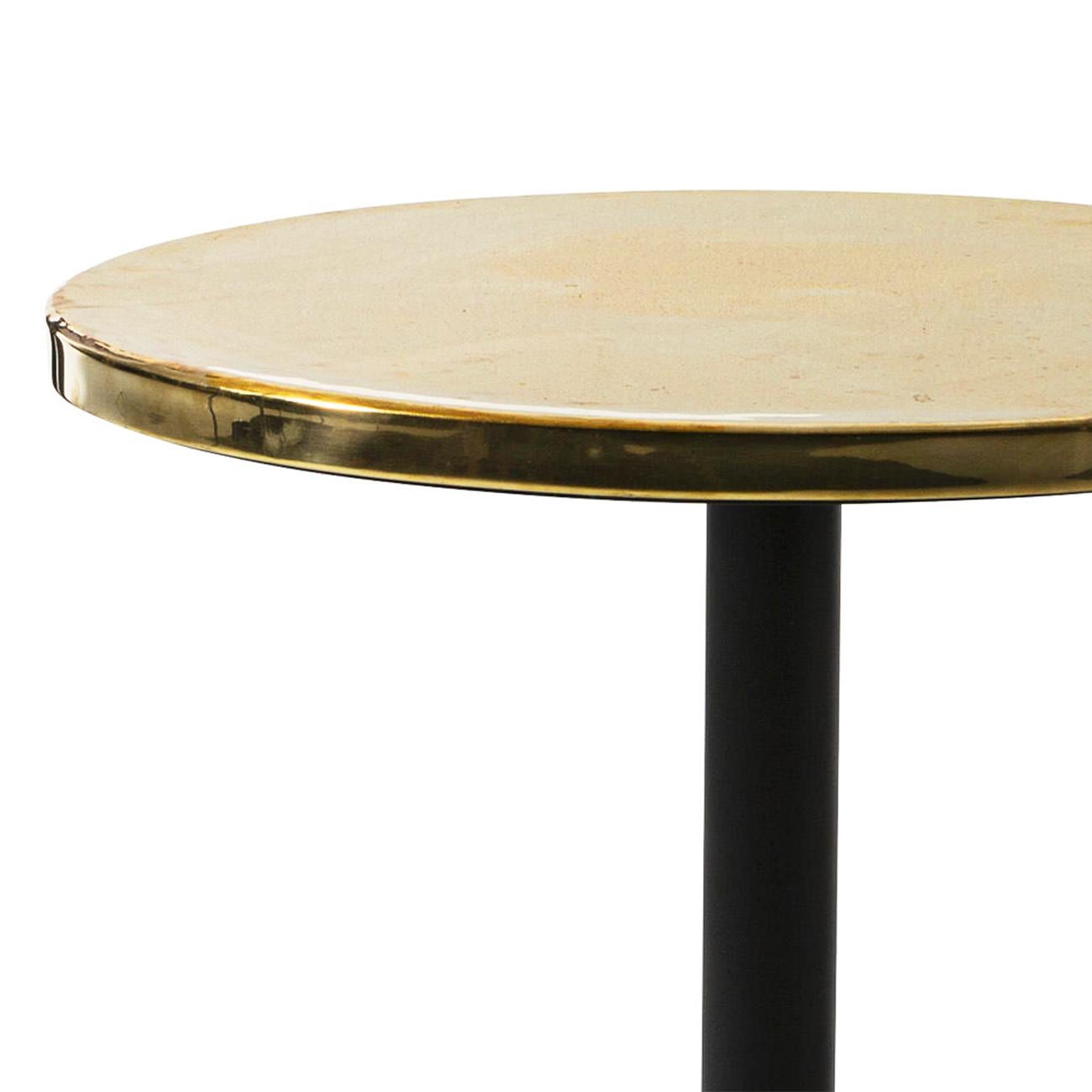 Round Table Shiny with casted iron base in black finish,
with wooden column base in black finish and with polished
glossy brass top.