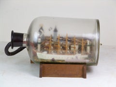 Ship and submarine with Nazi swastika in a bottle, 1940ca